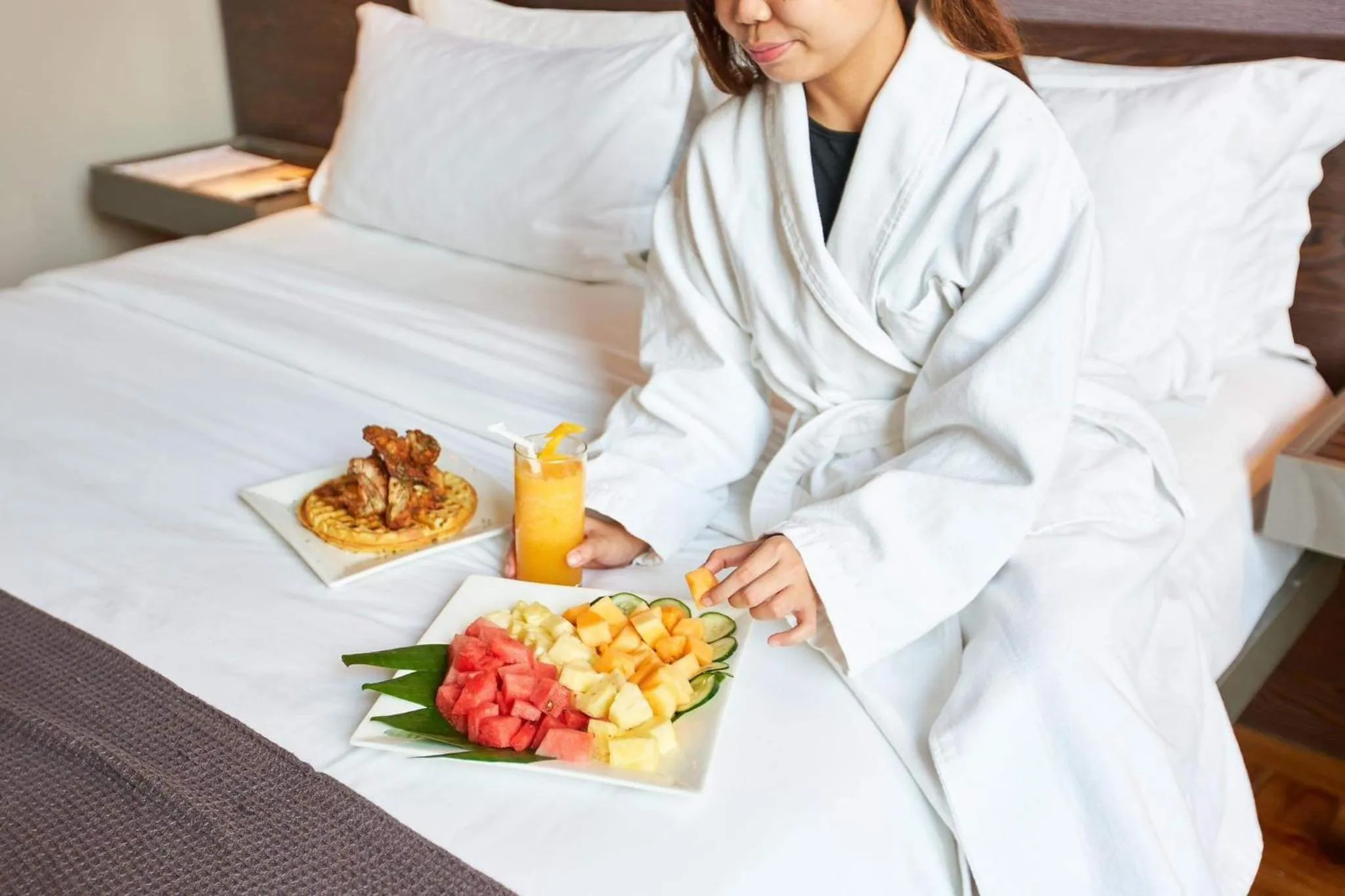 Bed in Ramada Encore by Wyndham Makati