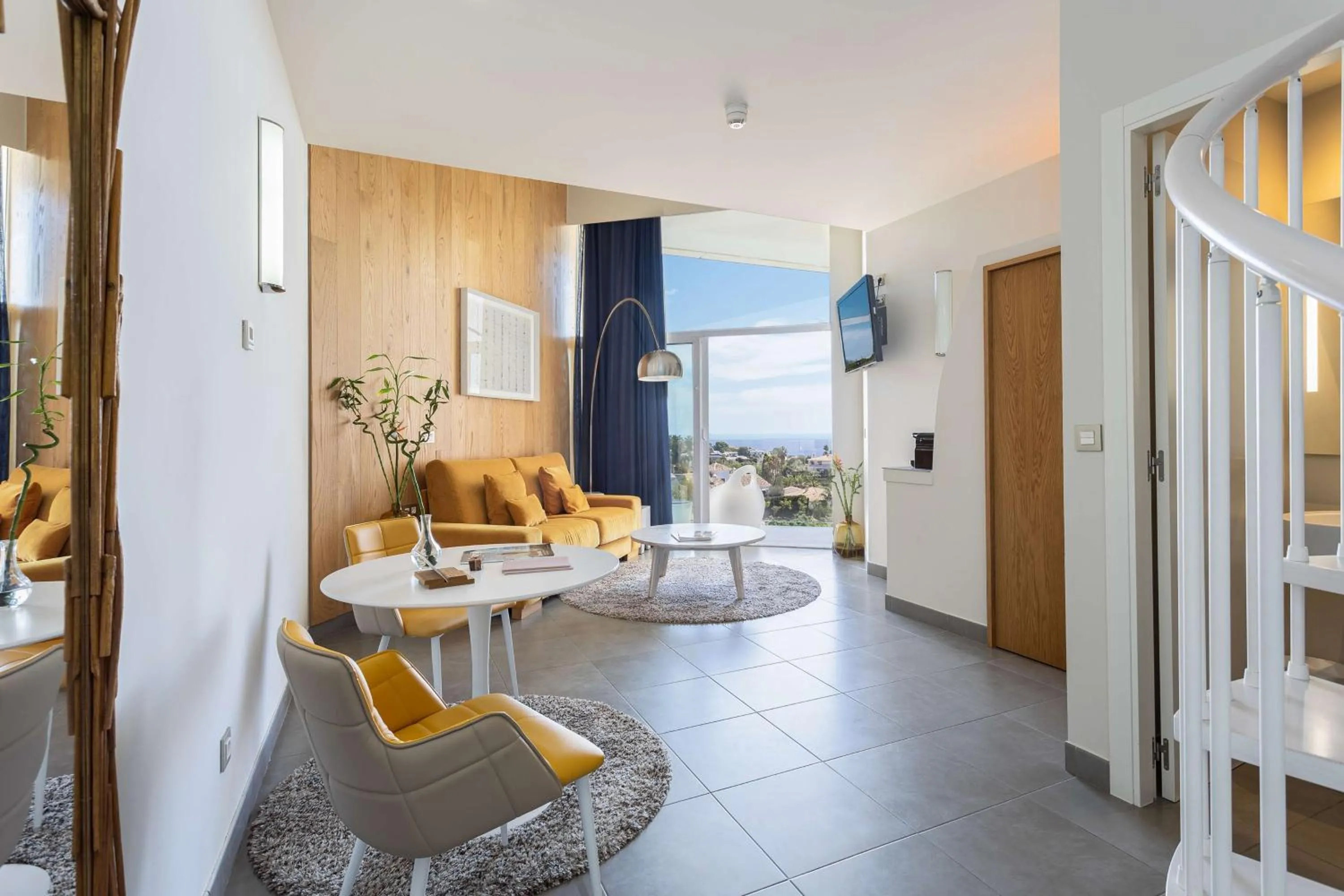 Living room in Higuerón Hotel Málaga, Curio Collection by Hilton