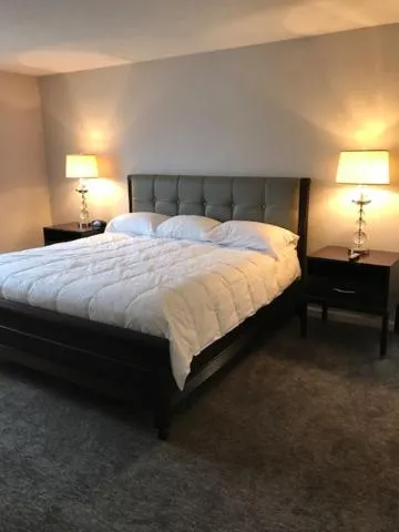 Bed in Ambassador Inn