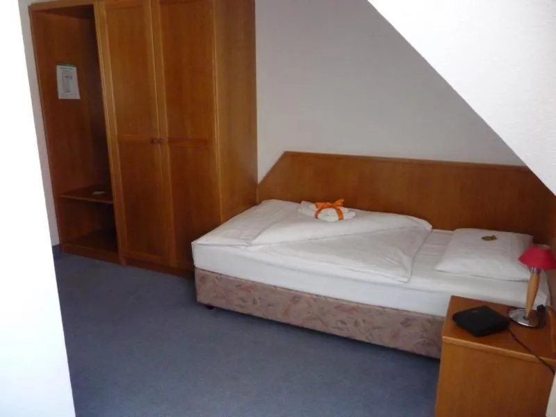 Bed in Hotel Mecklenburger Mühle Garni