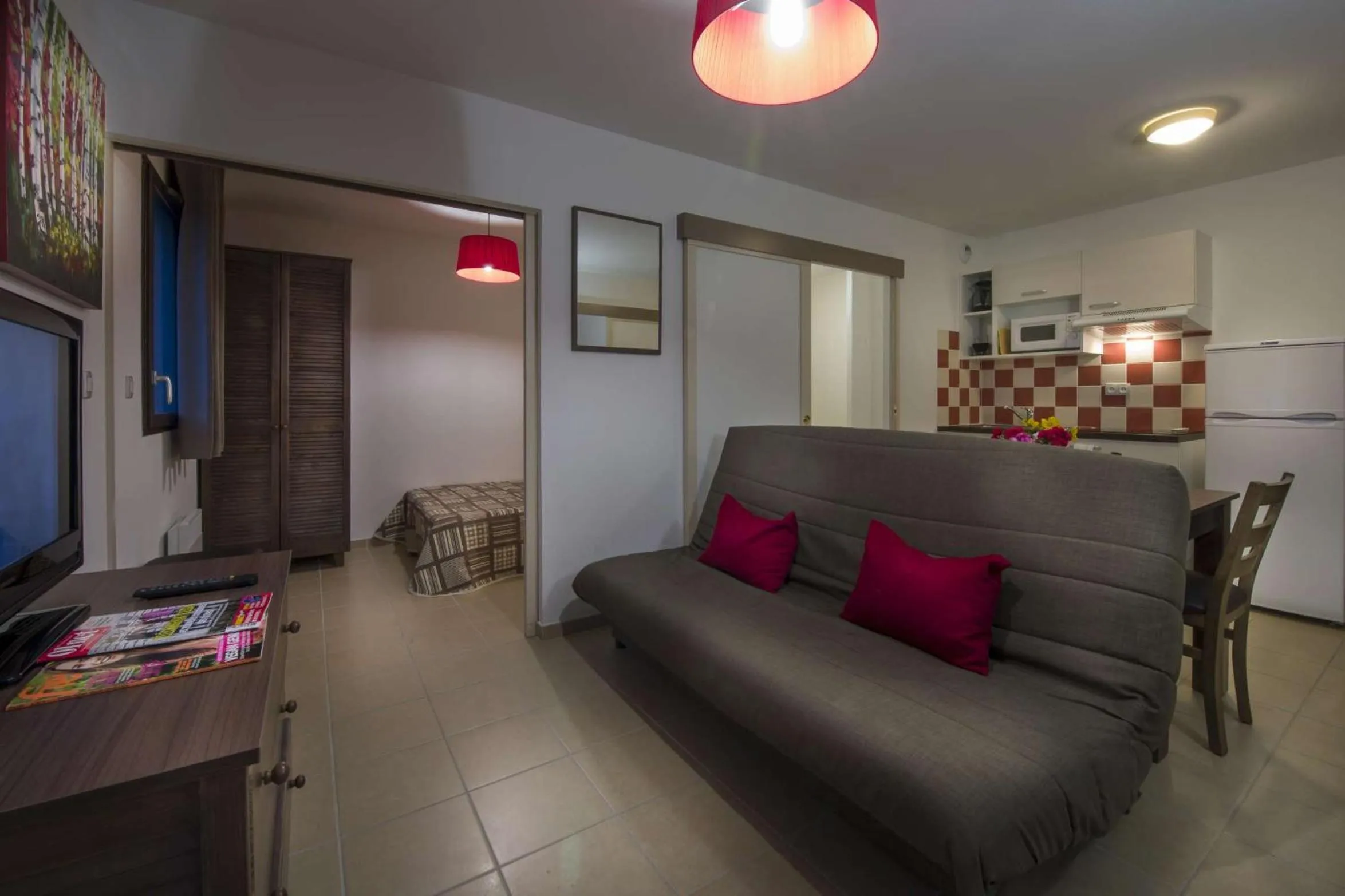 Living room in Vacancéole - Résidence Le Clos du Rocher