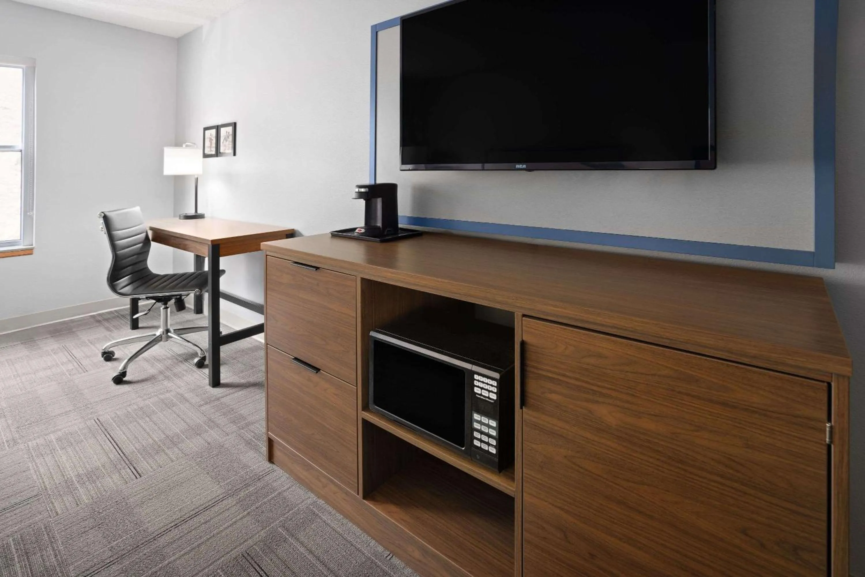 Photo of the whole room in AmericInn by Wyndham Iron Mountain