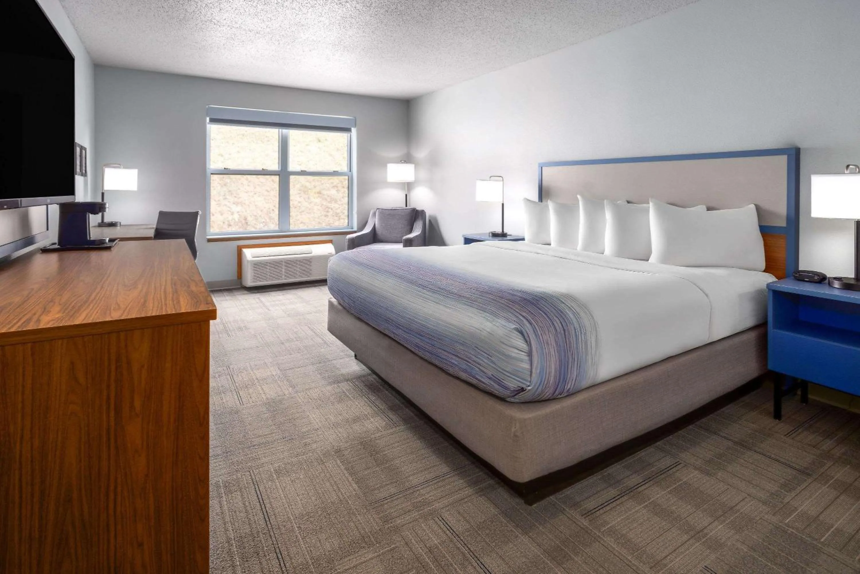 Photo of the whole room, Bed in AmericInn by Wyndham Iron Mountain