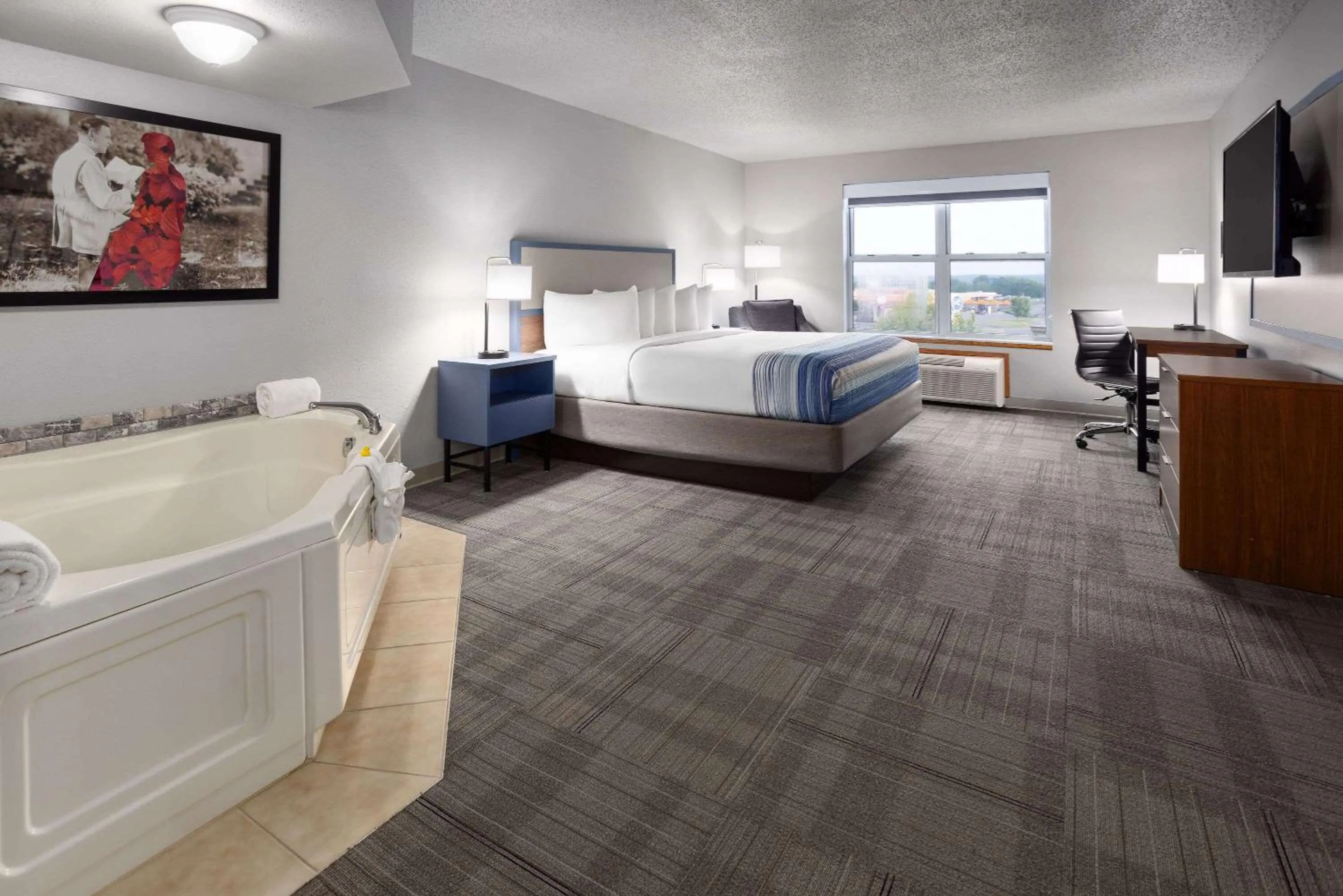 Photo of the whole room, Bed in AmericInn by Wyndham Iron Mountain