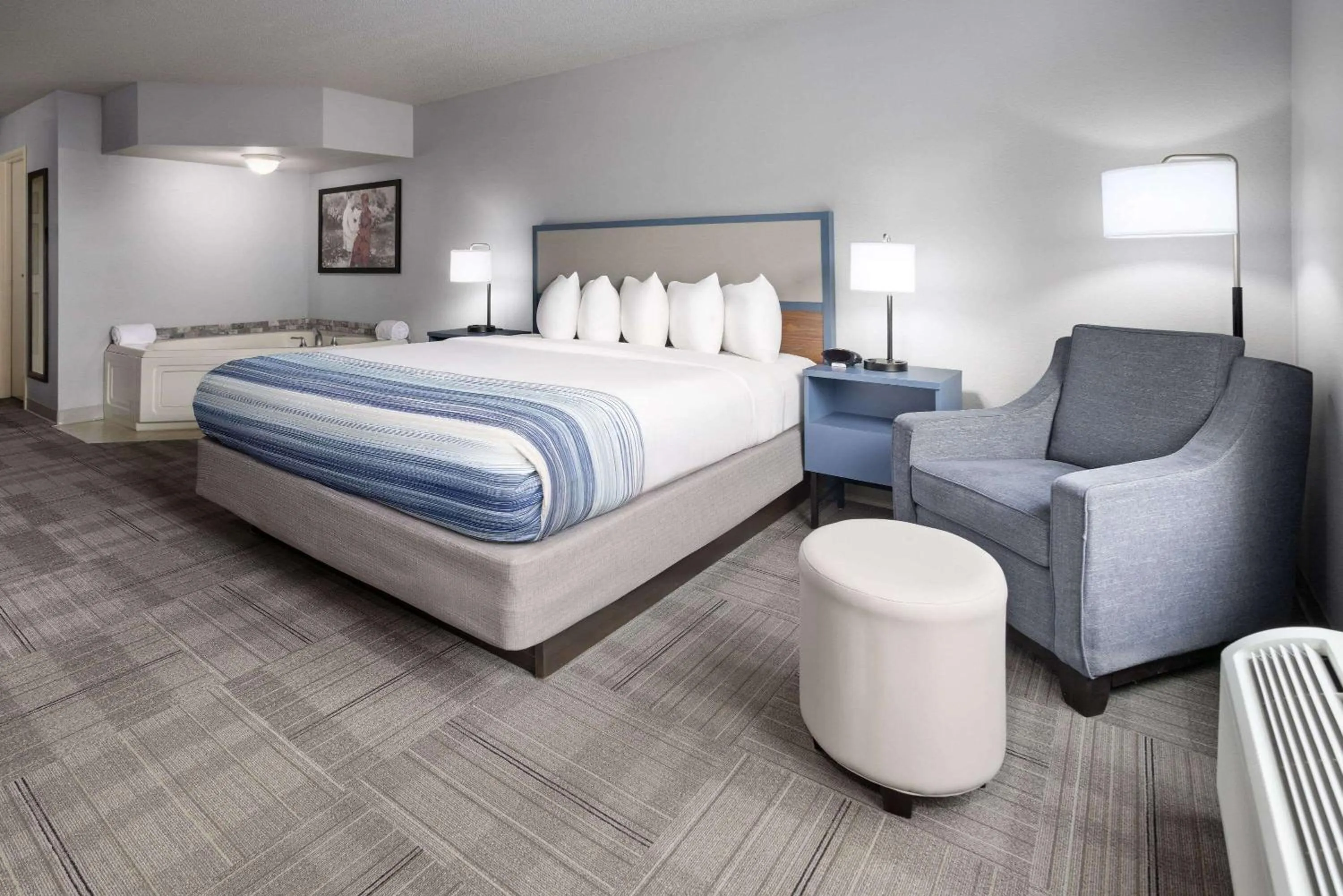Photo of the whole room, Bed in AmericInn by Wyndham Iron Mountain