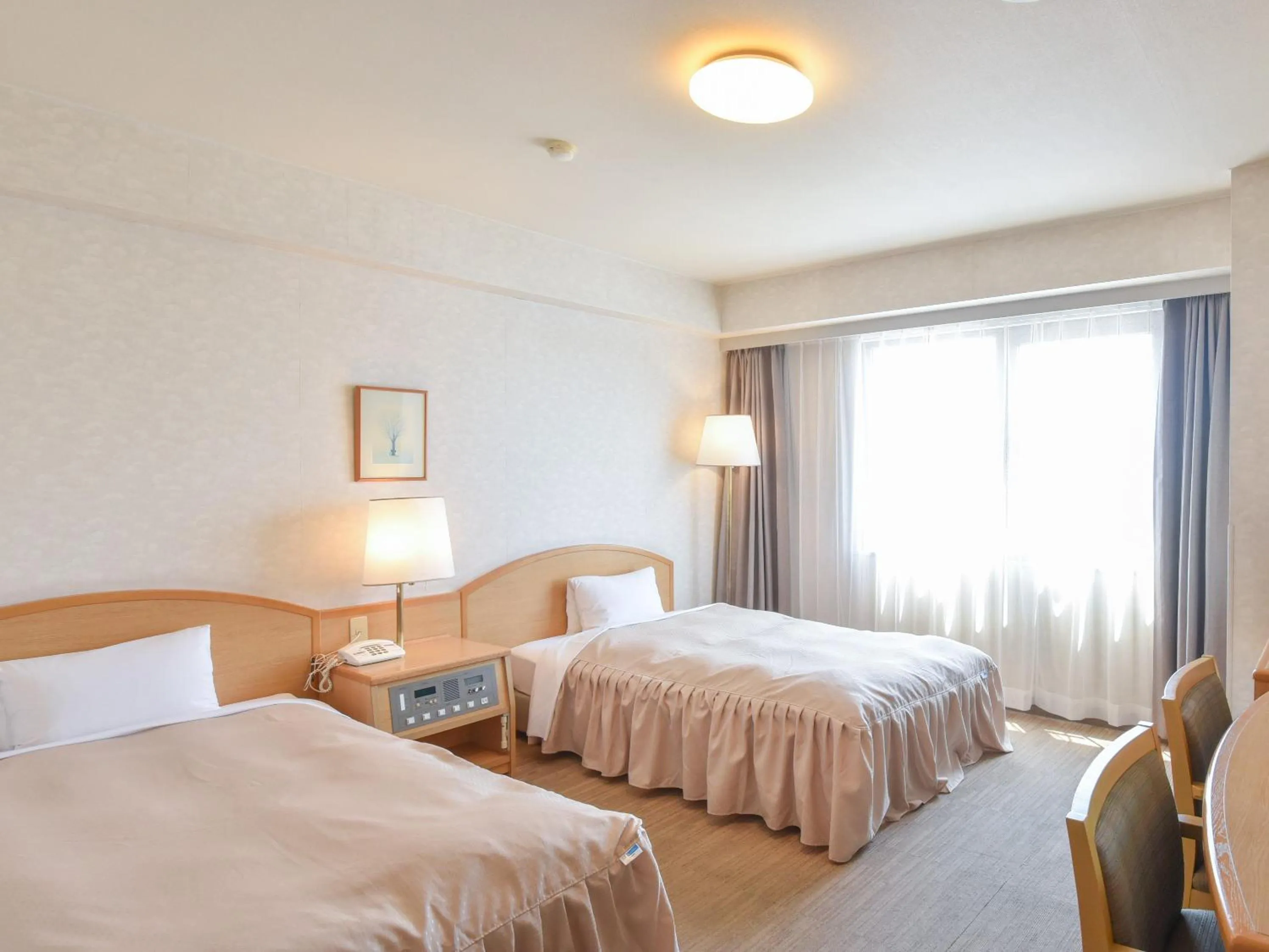 Bed in Yokkaichi City Hotel Annex