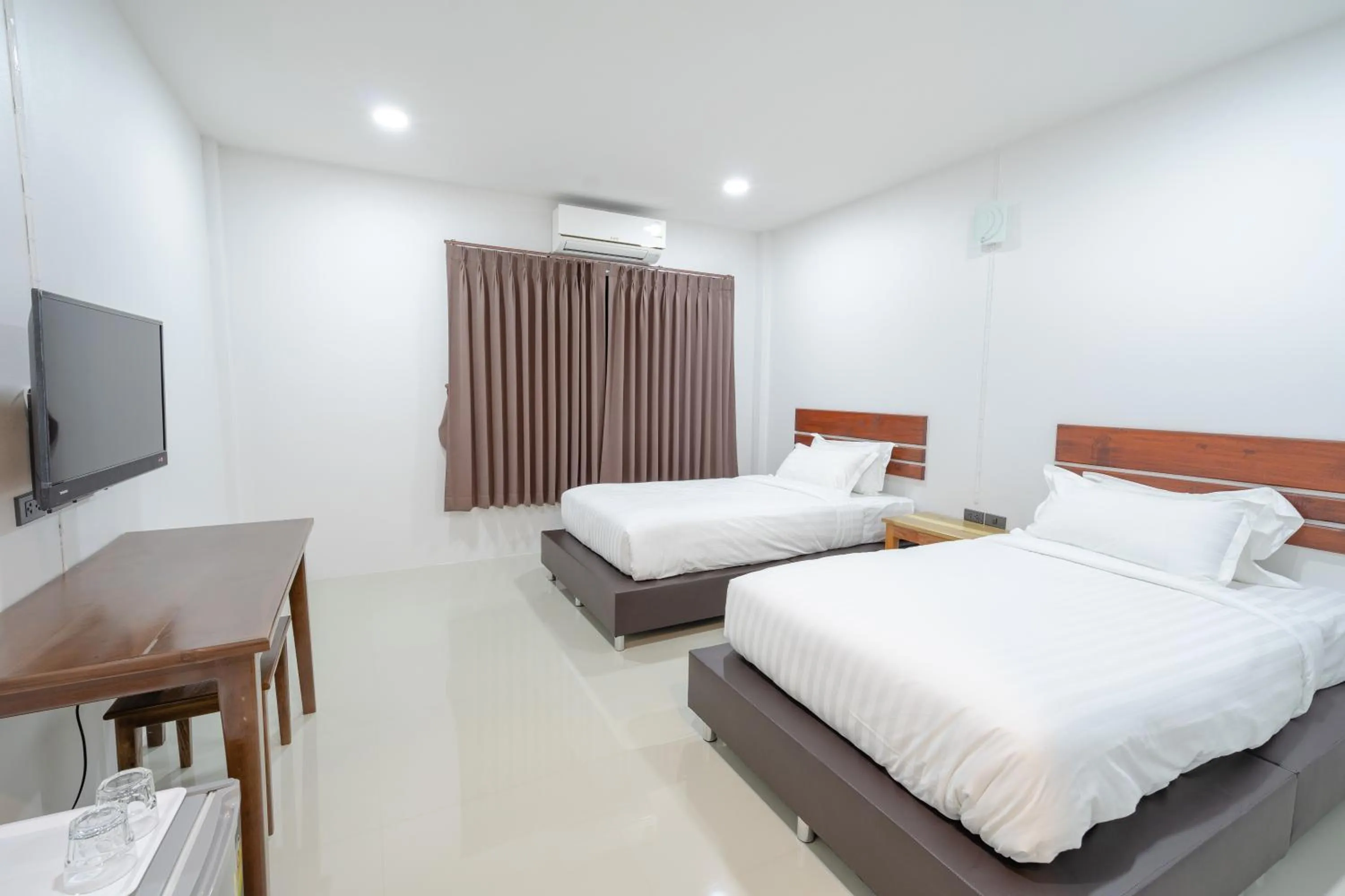 Bed in Myrrh Hotel Chanthaburi
