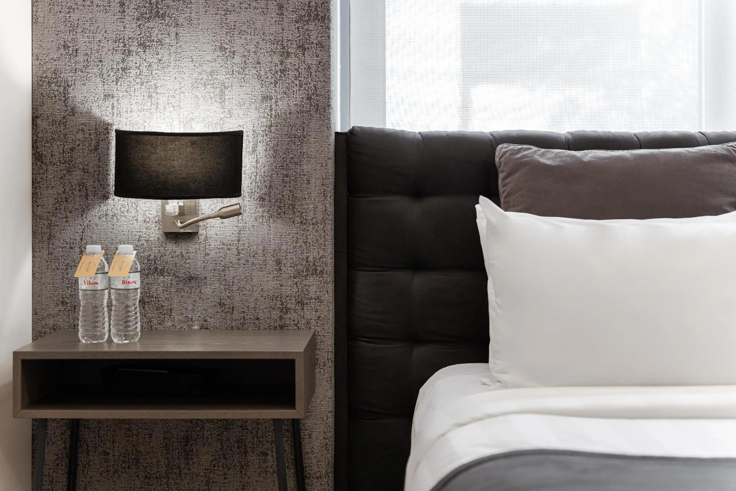 Bed in Acropolis Luxury Living