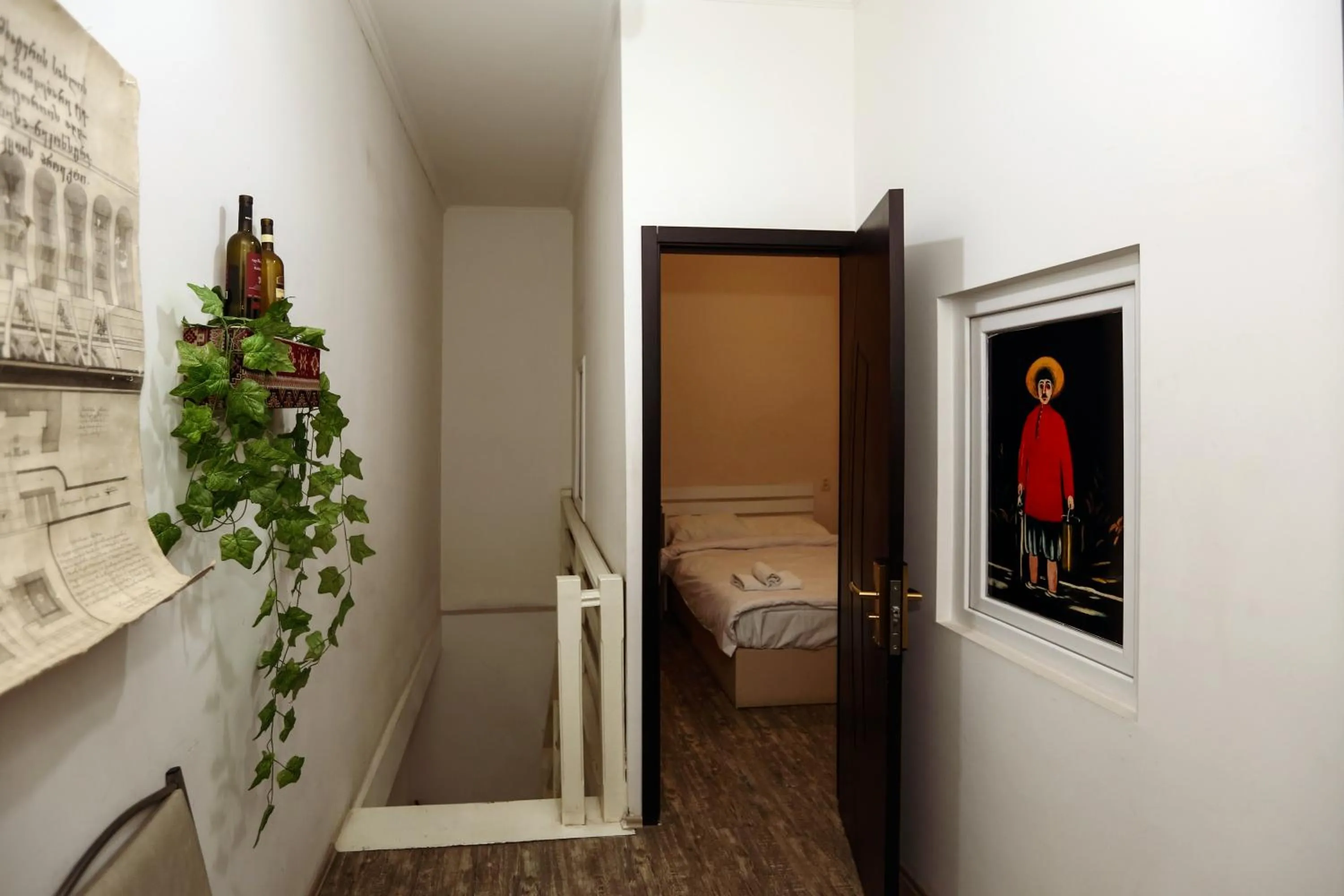 Communal lounge/ TV room, Bed in Hotel Rustaveli 36