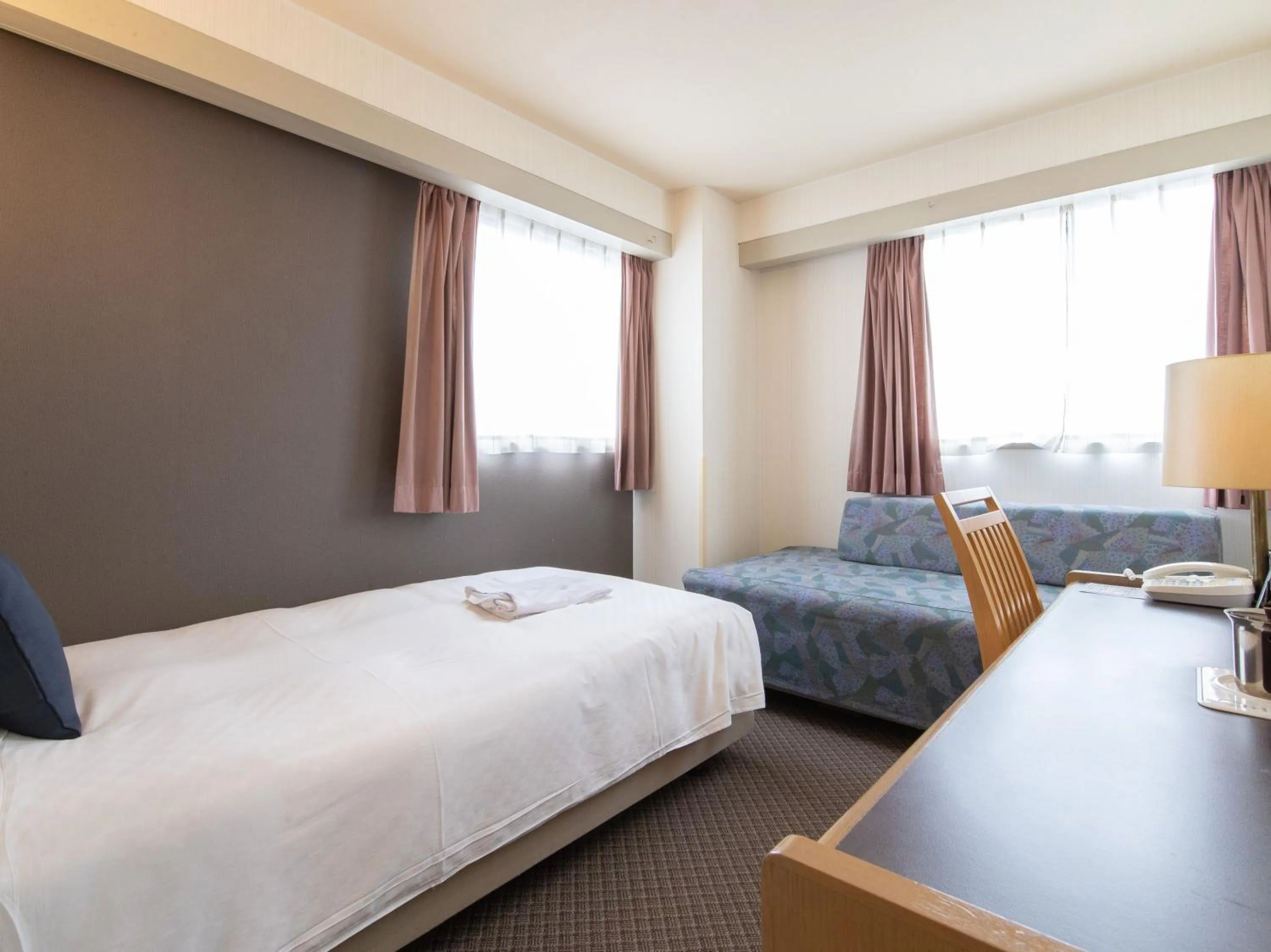 Bed in Nagasaki Orion Hotel