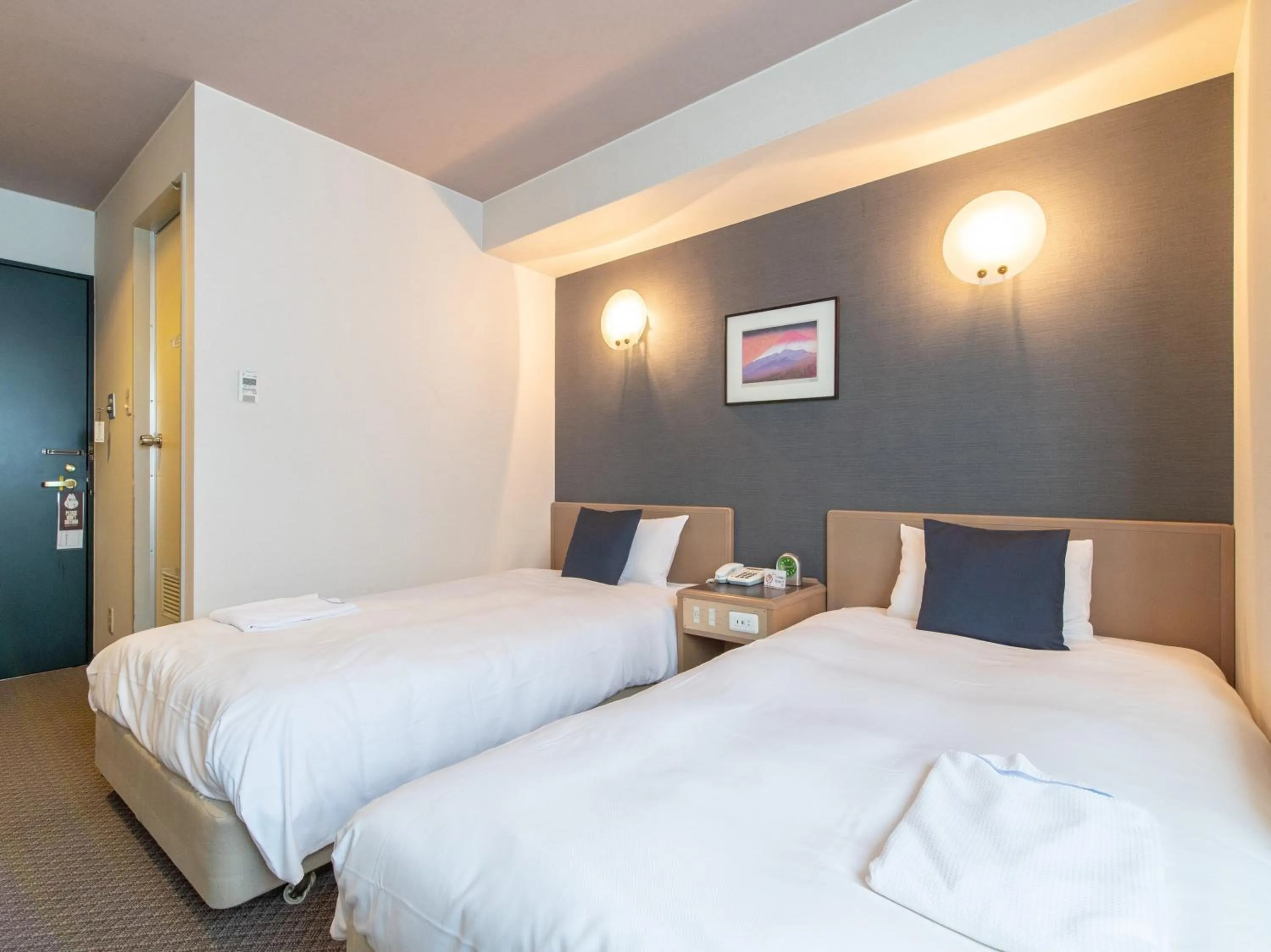 Bed in Nagasaki Orion Hotel