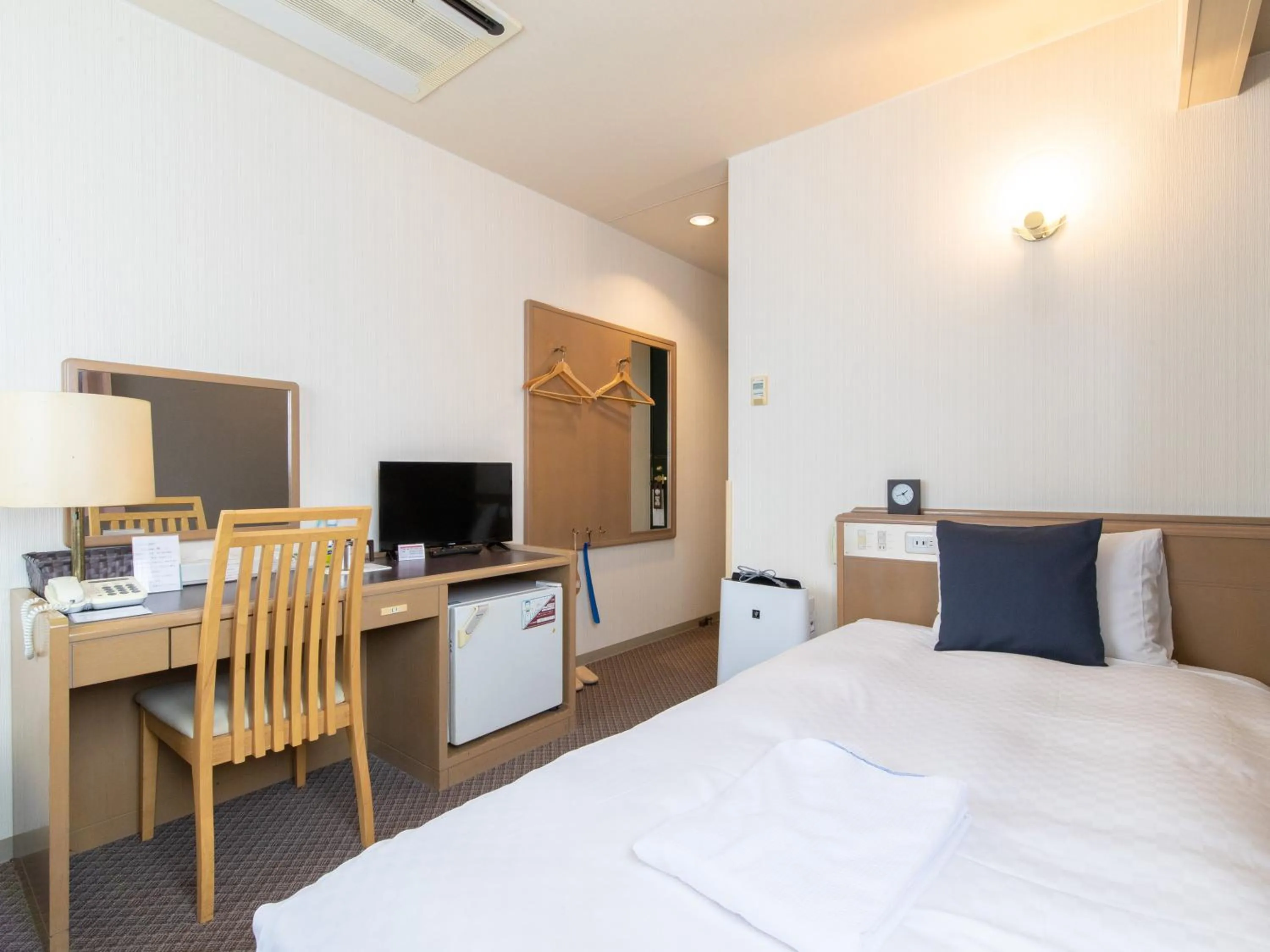 Bed in Nagasaki Orion Hotel