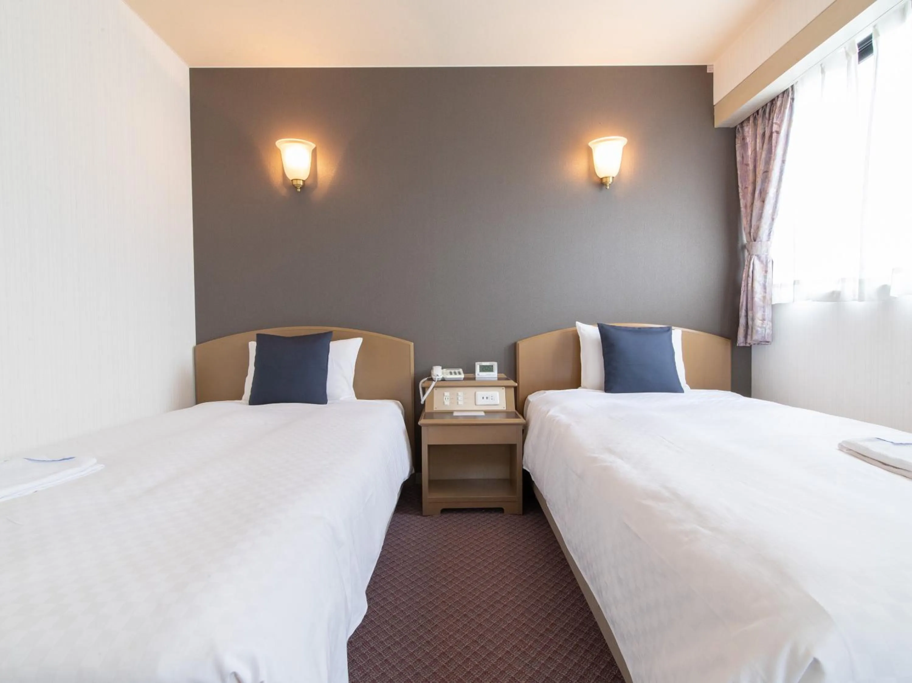 Bed in Nagasaki Orion Hotel