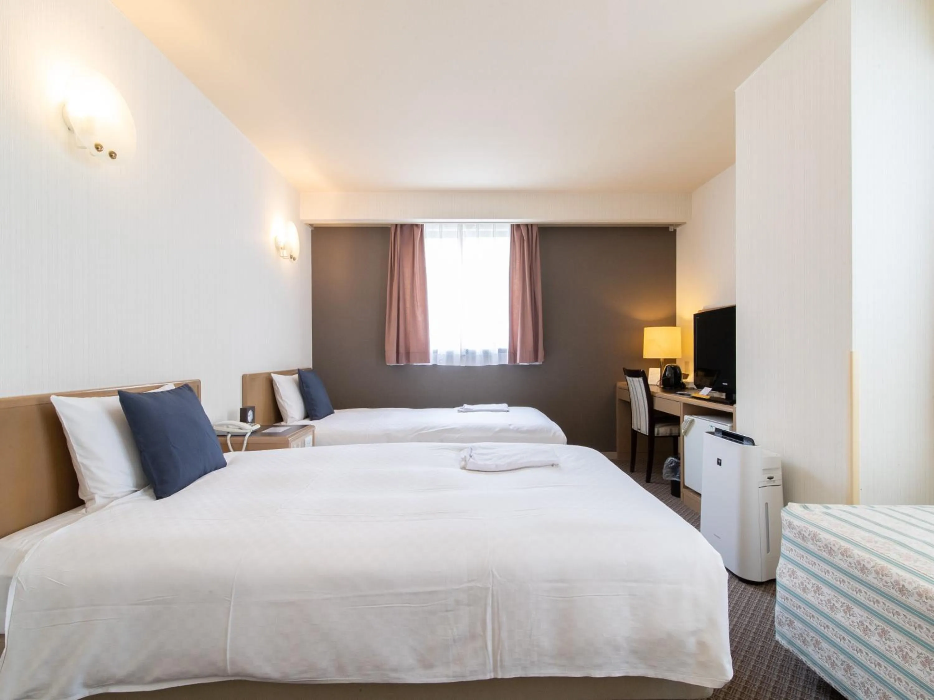 Bed in Nagasaki Orion Hotel