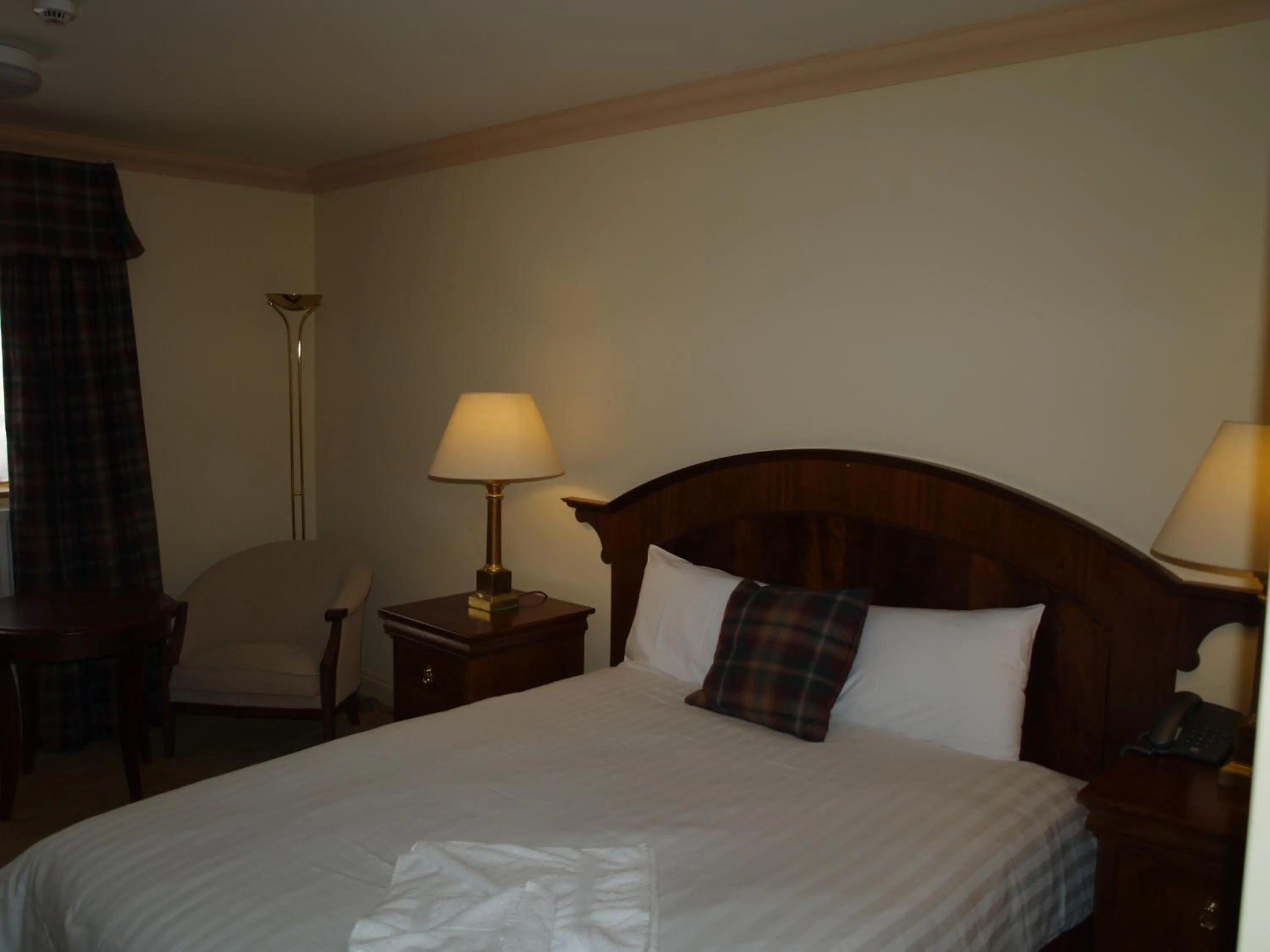 Bed in The Olde Windmill Inn