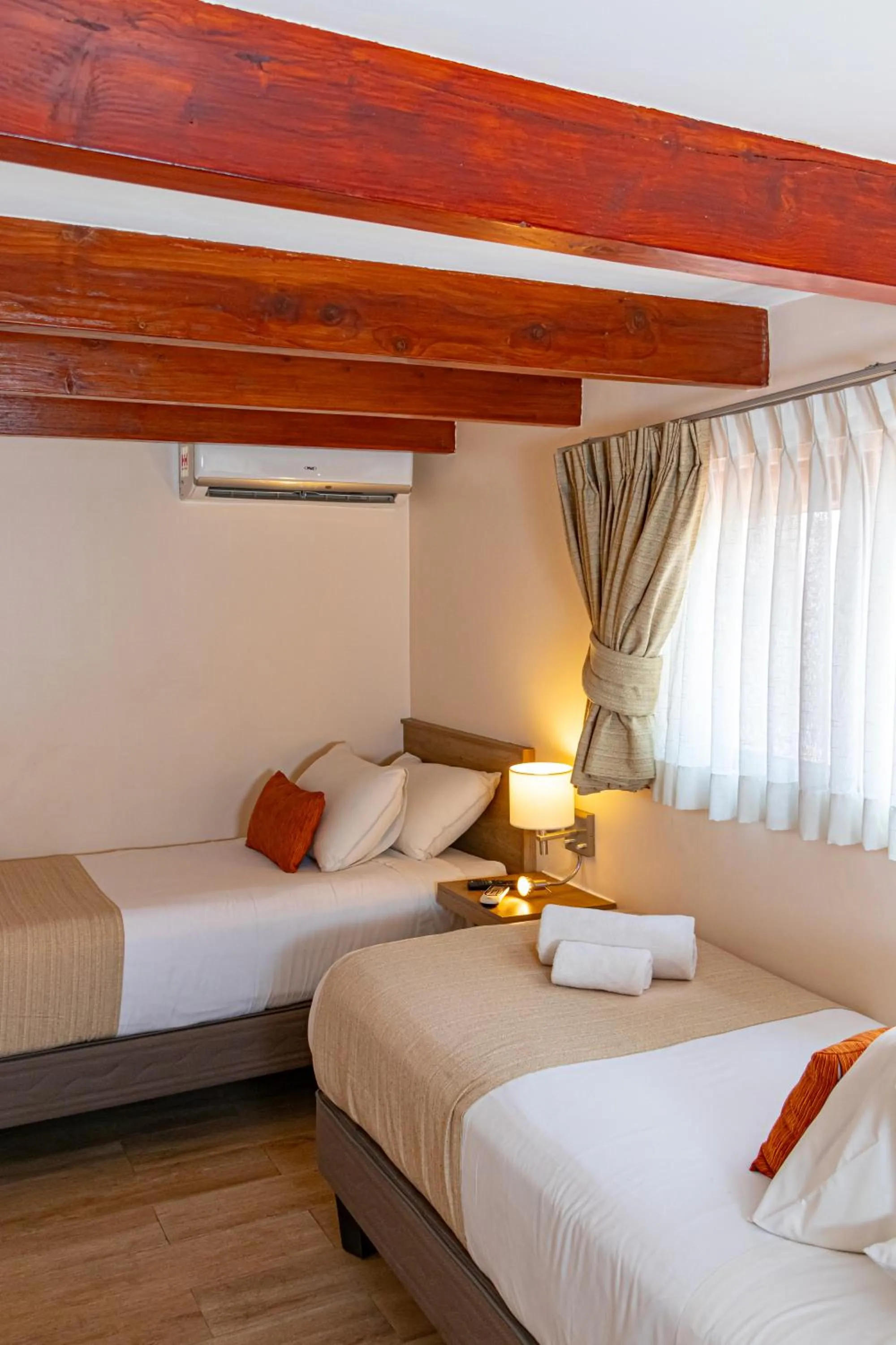 Bed in Tagle Hotel Boutique