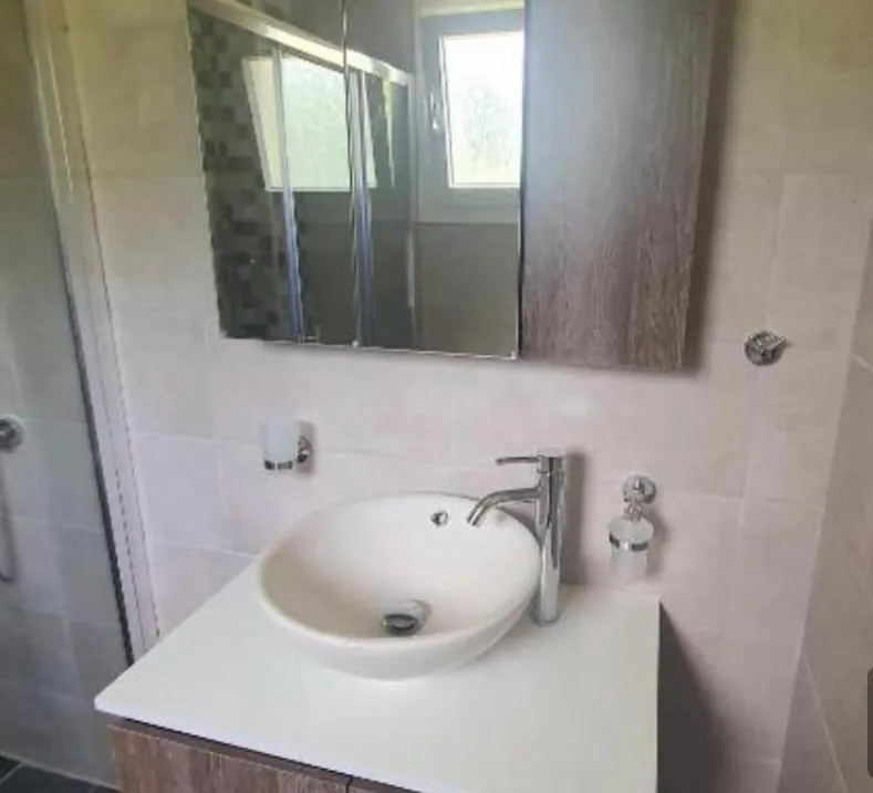 Bathroom in BELLA De LUX APTS