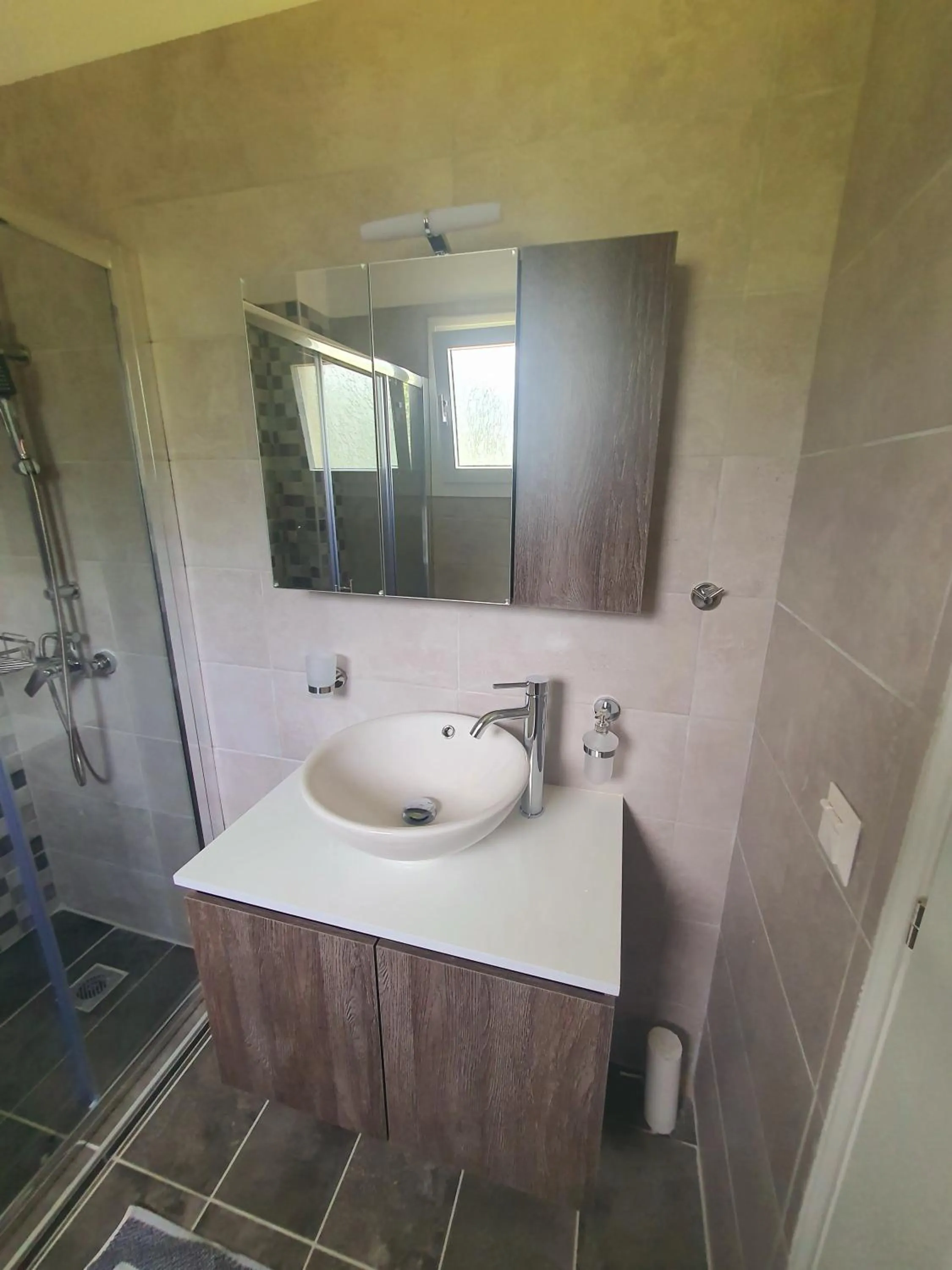 Bathroom in BELLA De LUX APTS