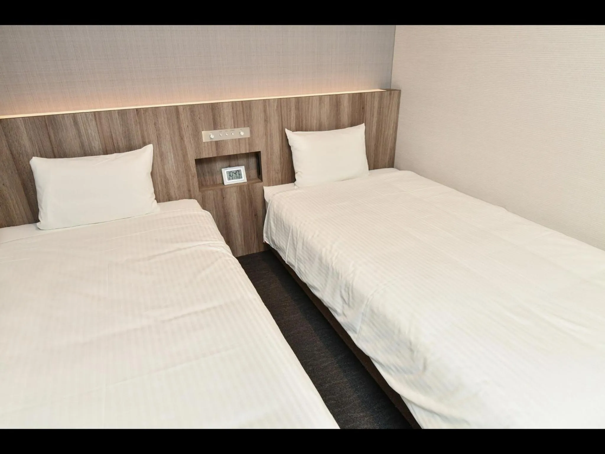 Bed in Sanco Inn Osaka Yodoyabashi