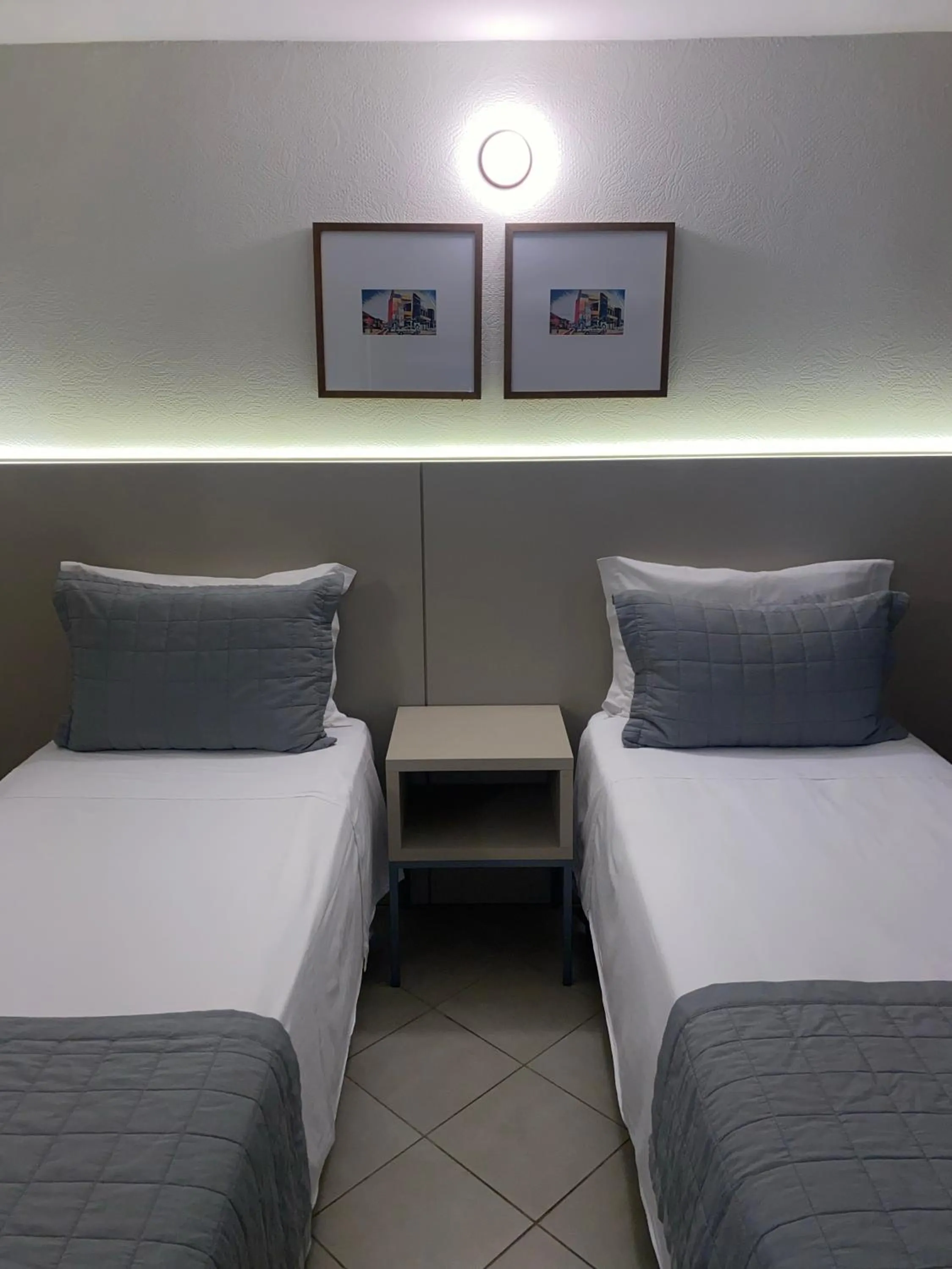 Bed in Malibu Plaza Hotel