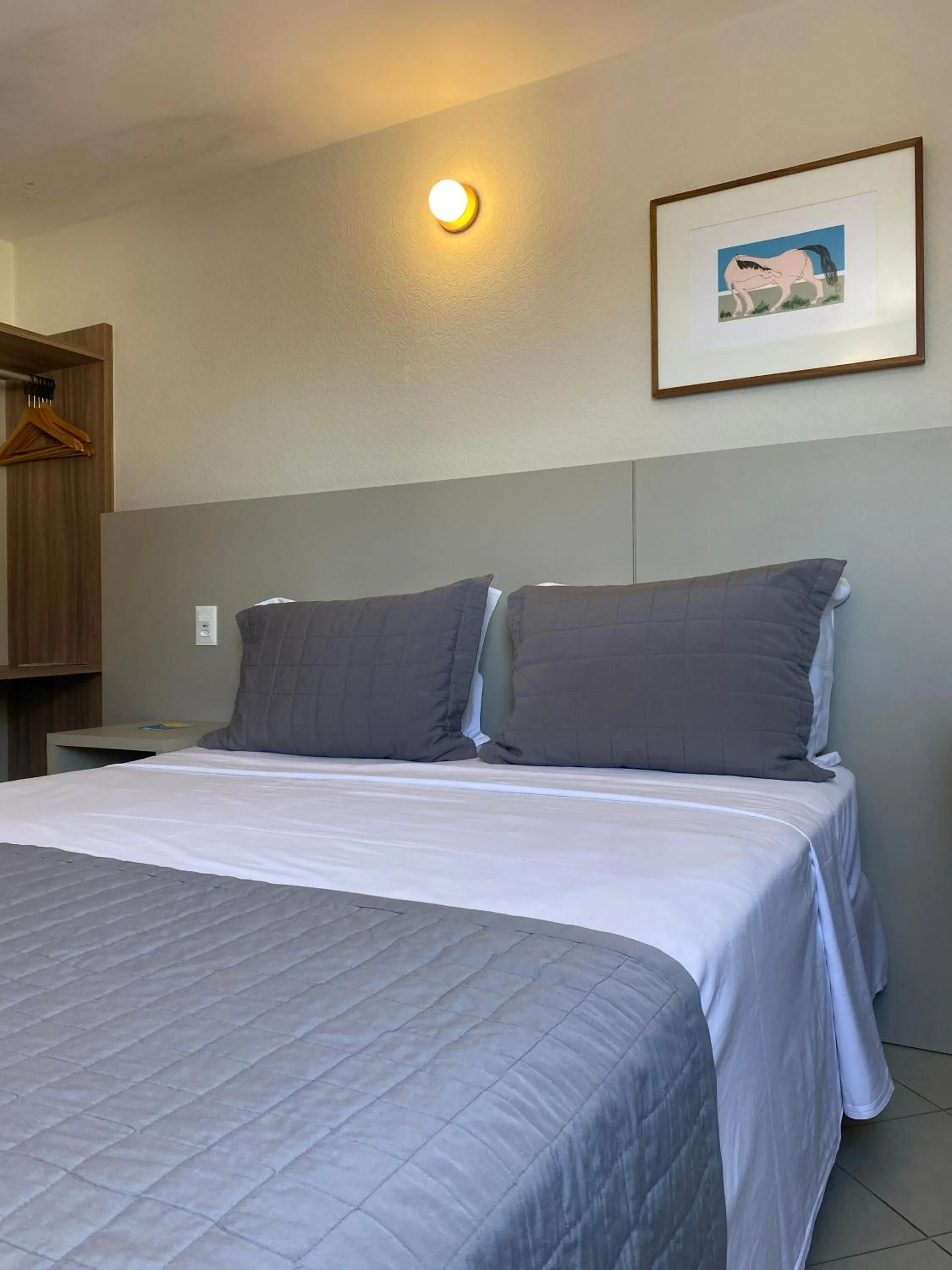 Bed in Malibu Plaza Hotel