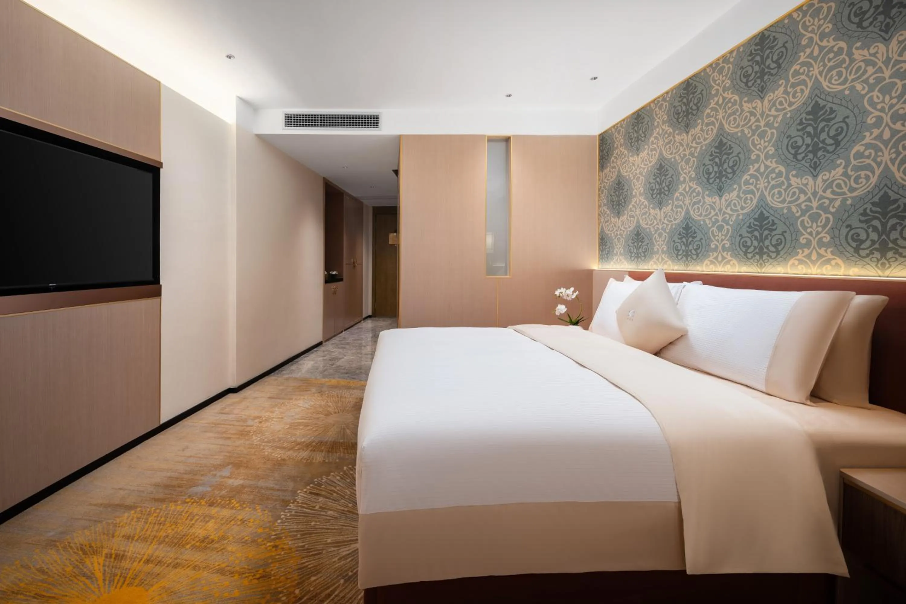 Bed in Guangzhou Wogo Yuanbao Hotel-Zhujiang New Town