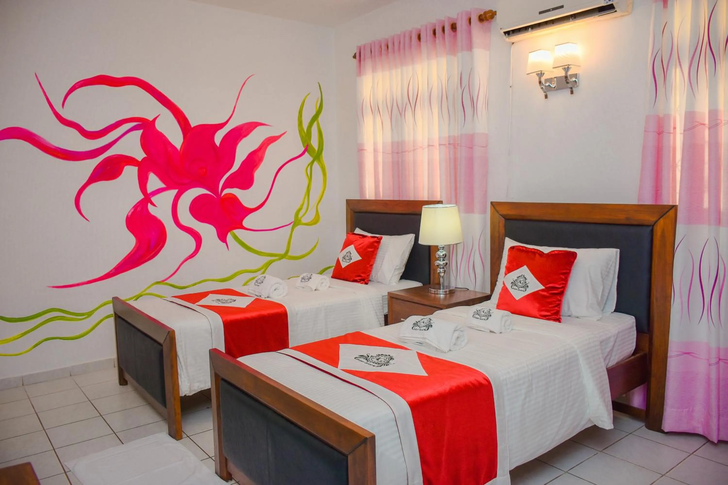 Bed in Asian Grand Hotel