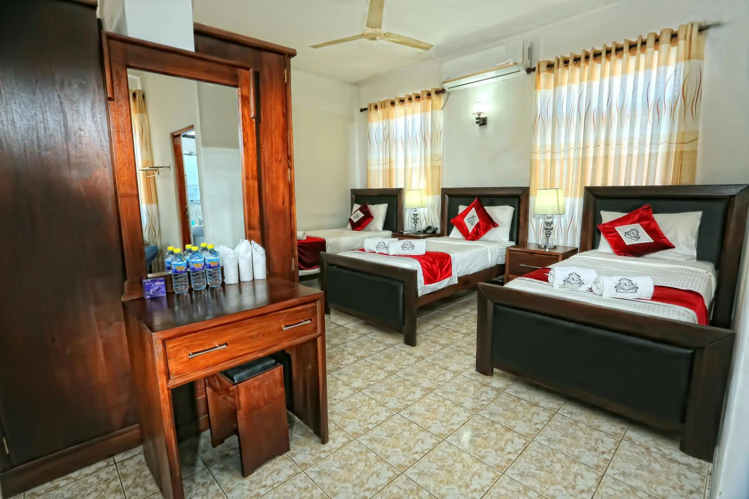 Bed in Asian Grand Hotel