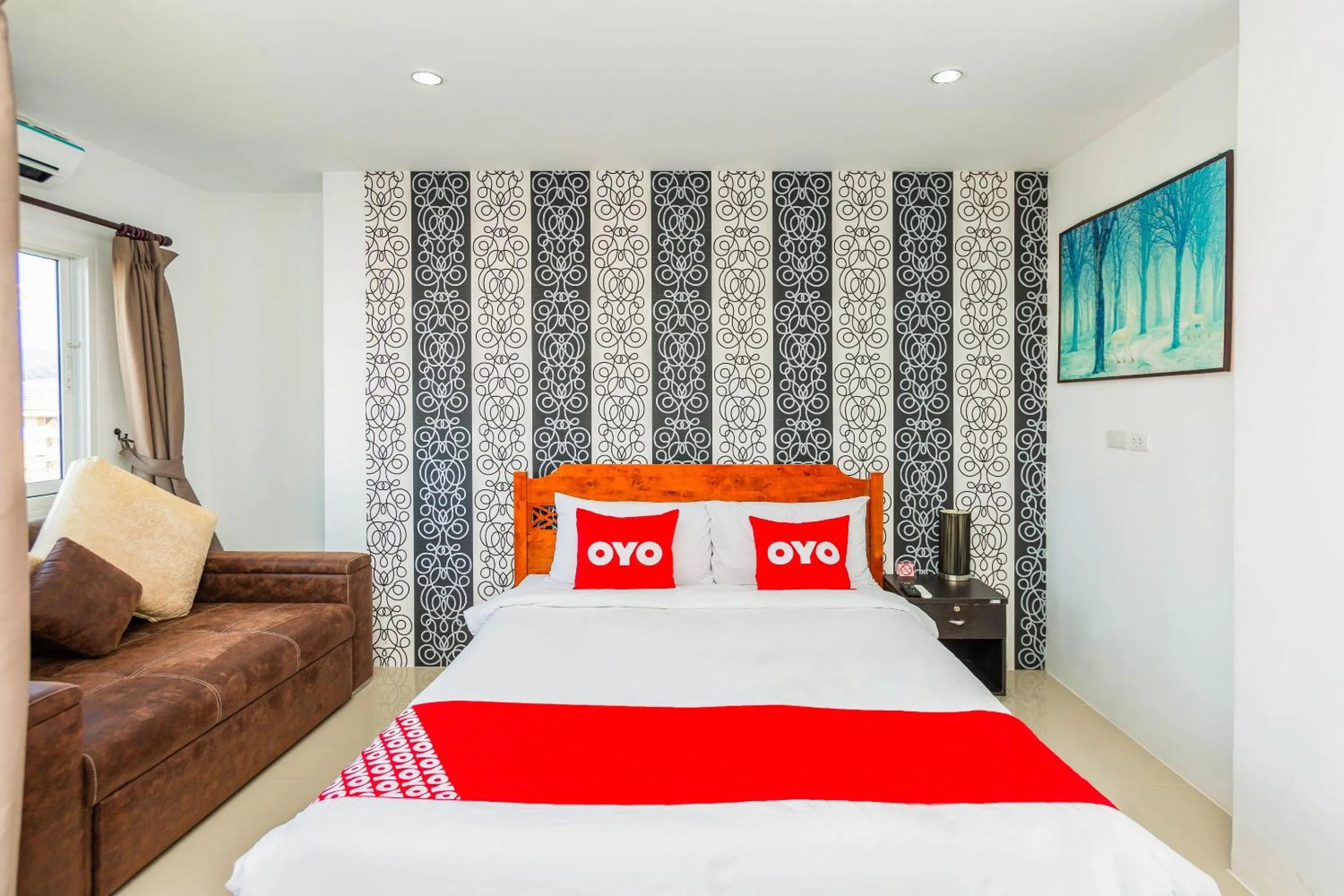 Bedroom in OYO 472 Tang Cheng Holiday Hotel