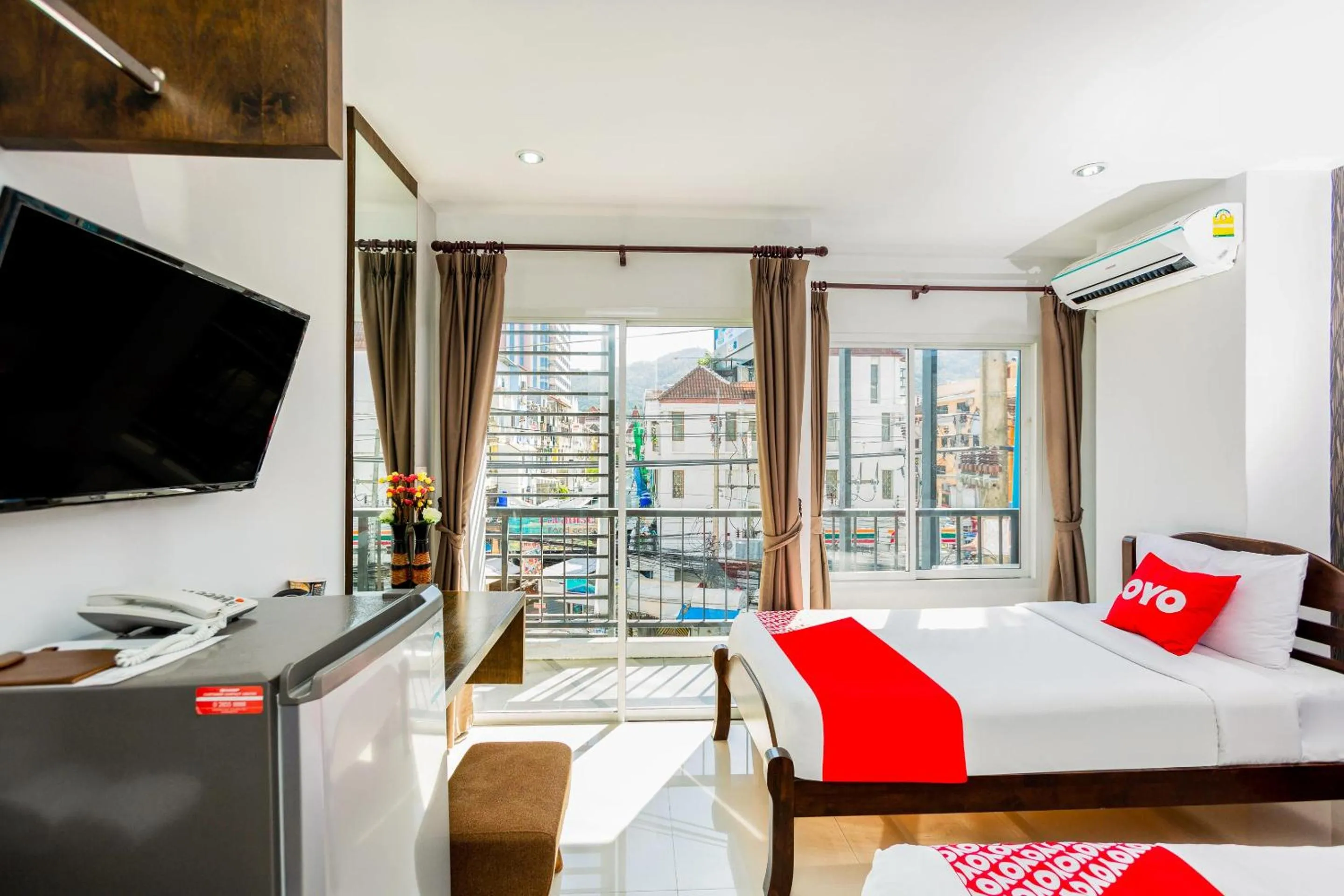 Bedroom in OYO 472 Tang Cheng Holiday Hotel