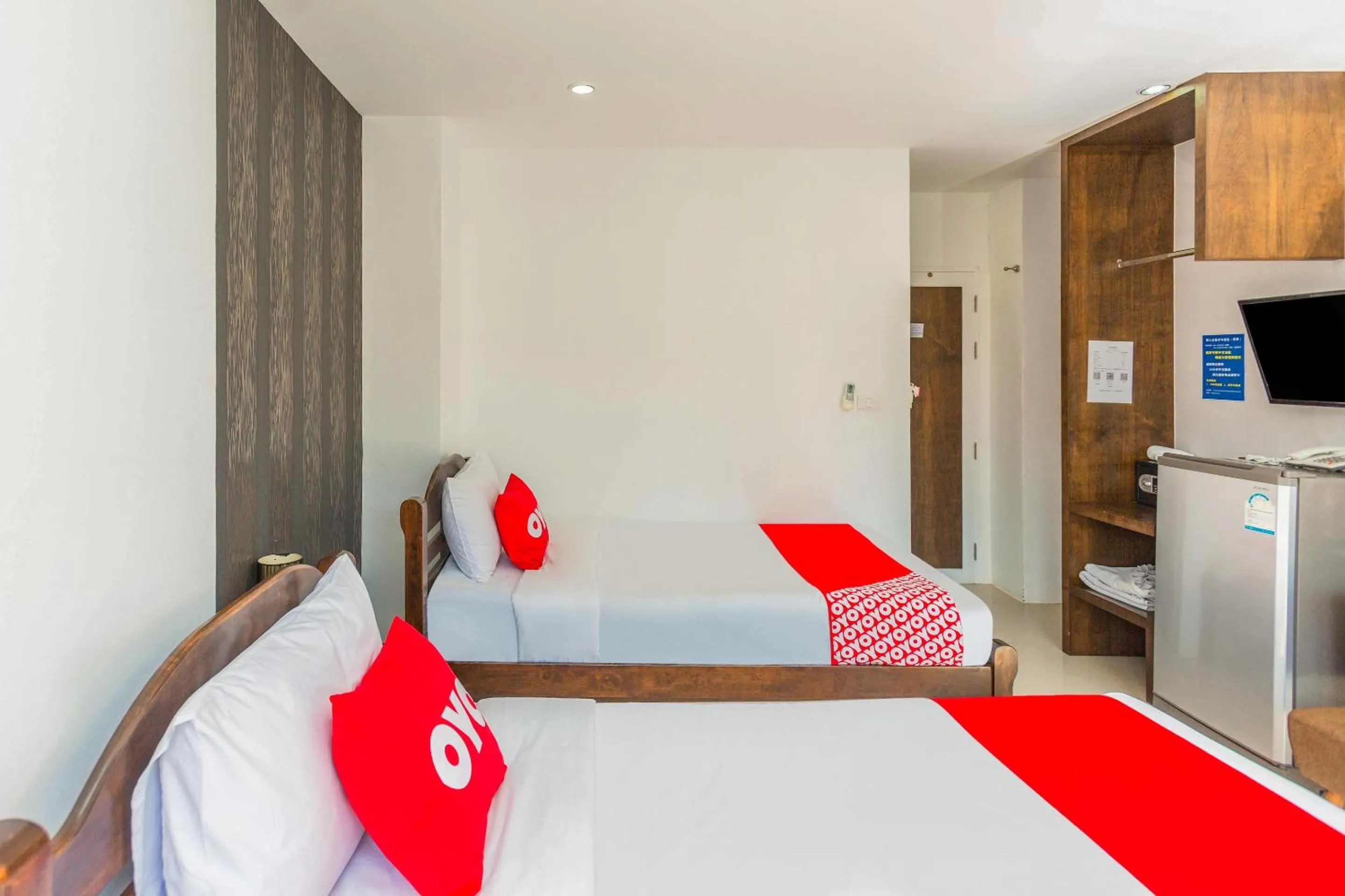 Bedroom in OYO 472 Tang Cheng Holiday Hotel