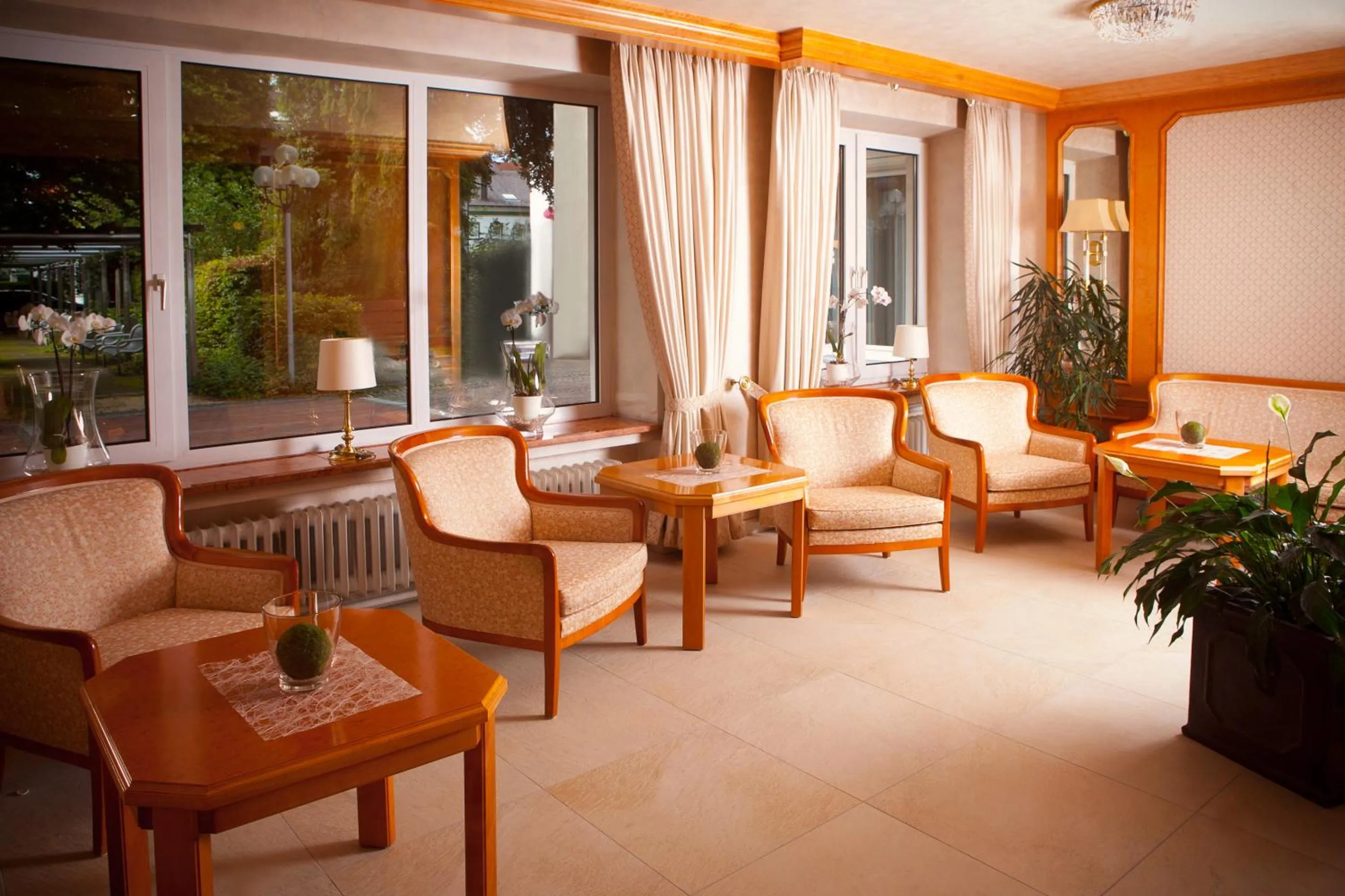 Communal lounge/ TV room in Kurhotel Roswitha