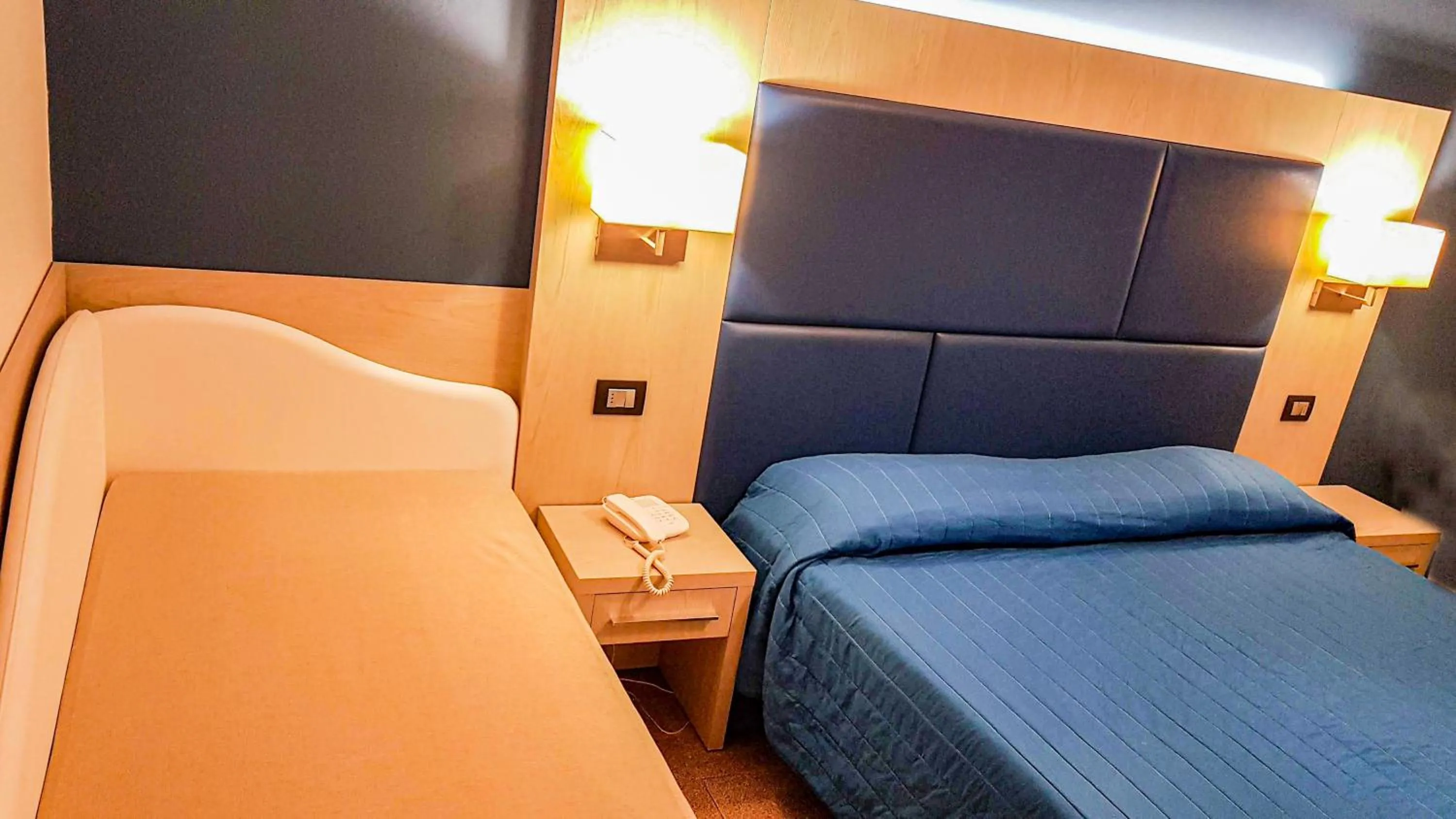 Bed in Hotel Cavalluccio Marino