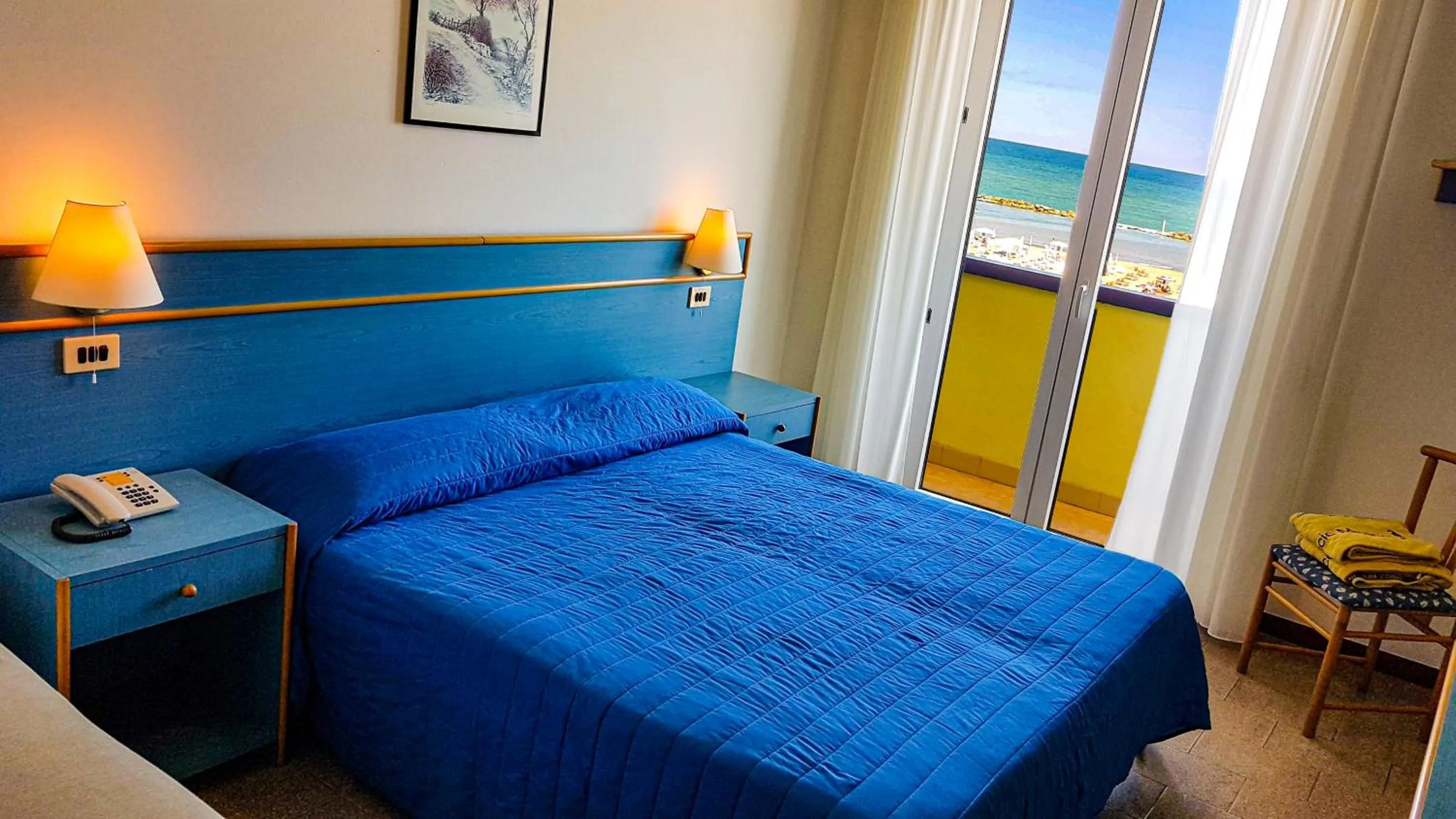 Bed in Hotel Cavalluccio Marino