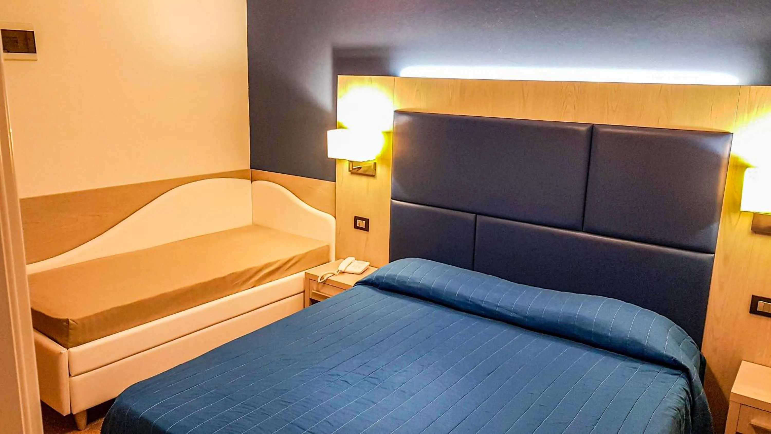 Bed in Hotel Cavalluccio Marino