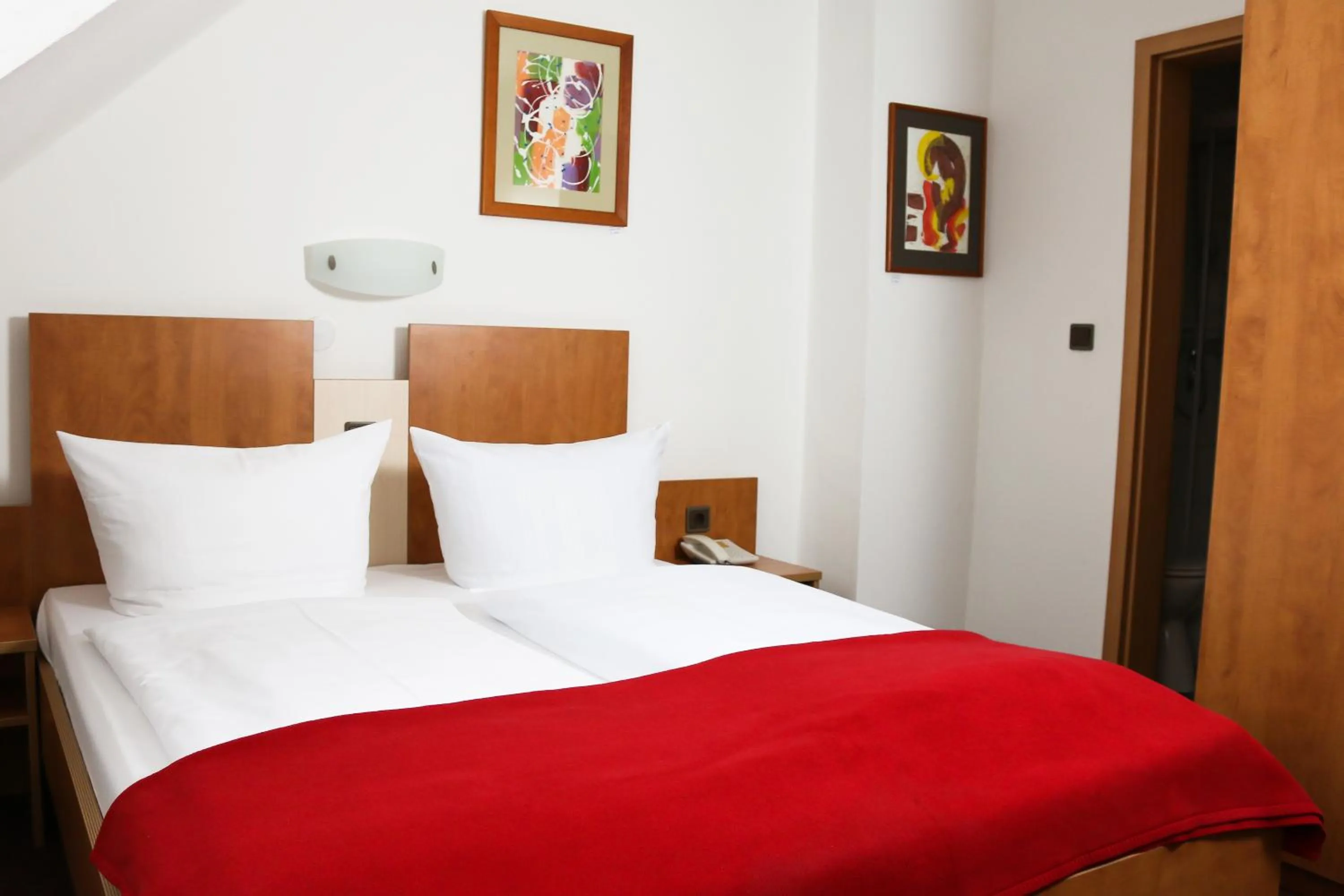 Bed in City Hotel Journal