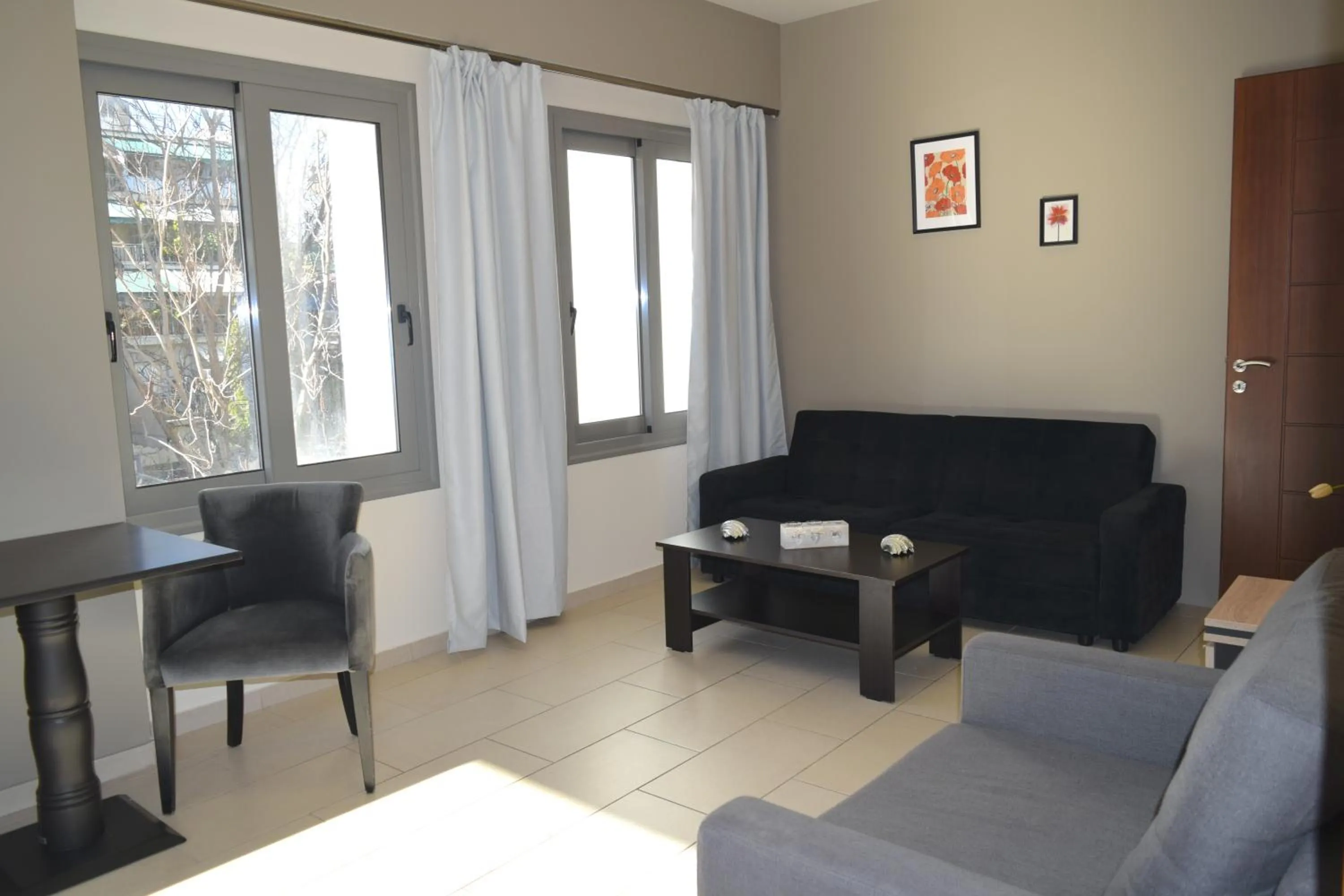 Seating area in Athenian Central Apartments