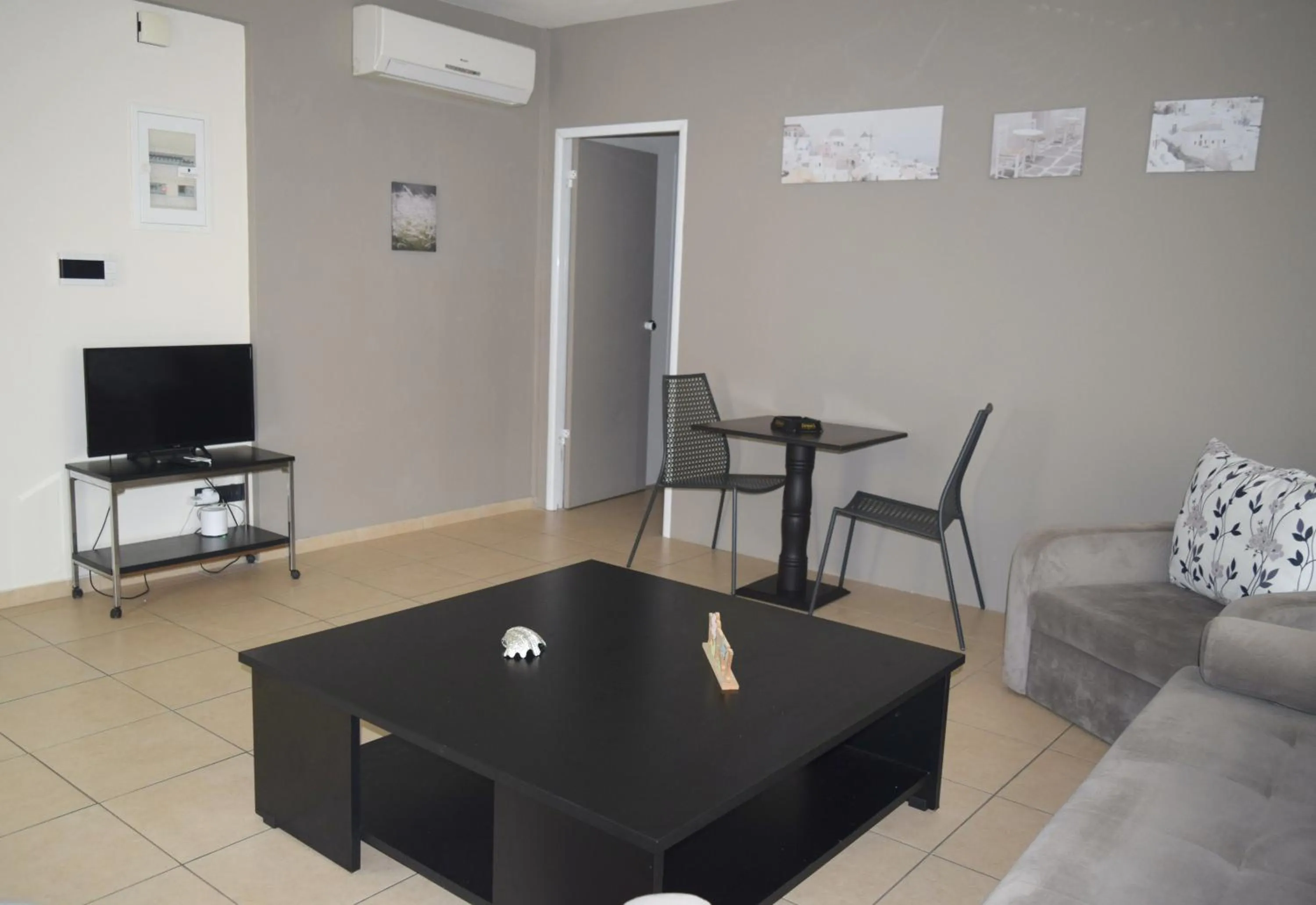 Seating area in Athenian Central Apartments