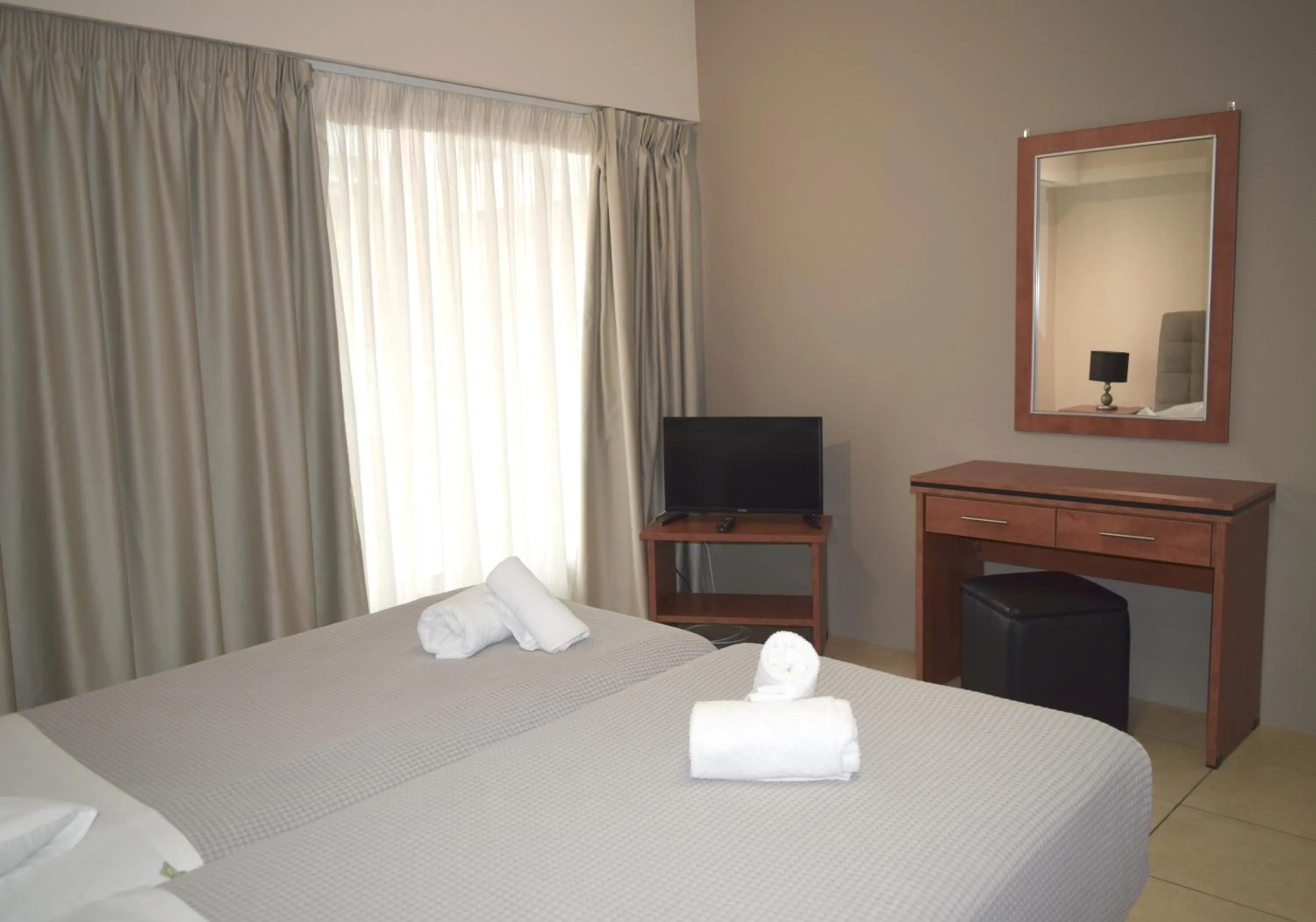 Bedroom in Athenian Central Apartments