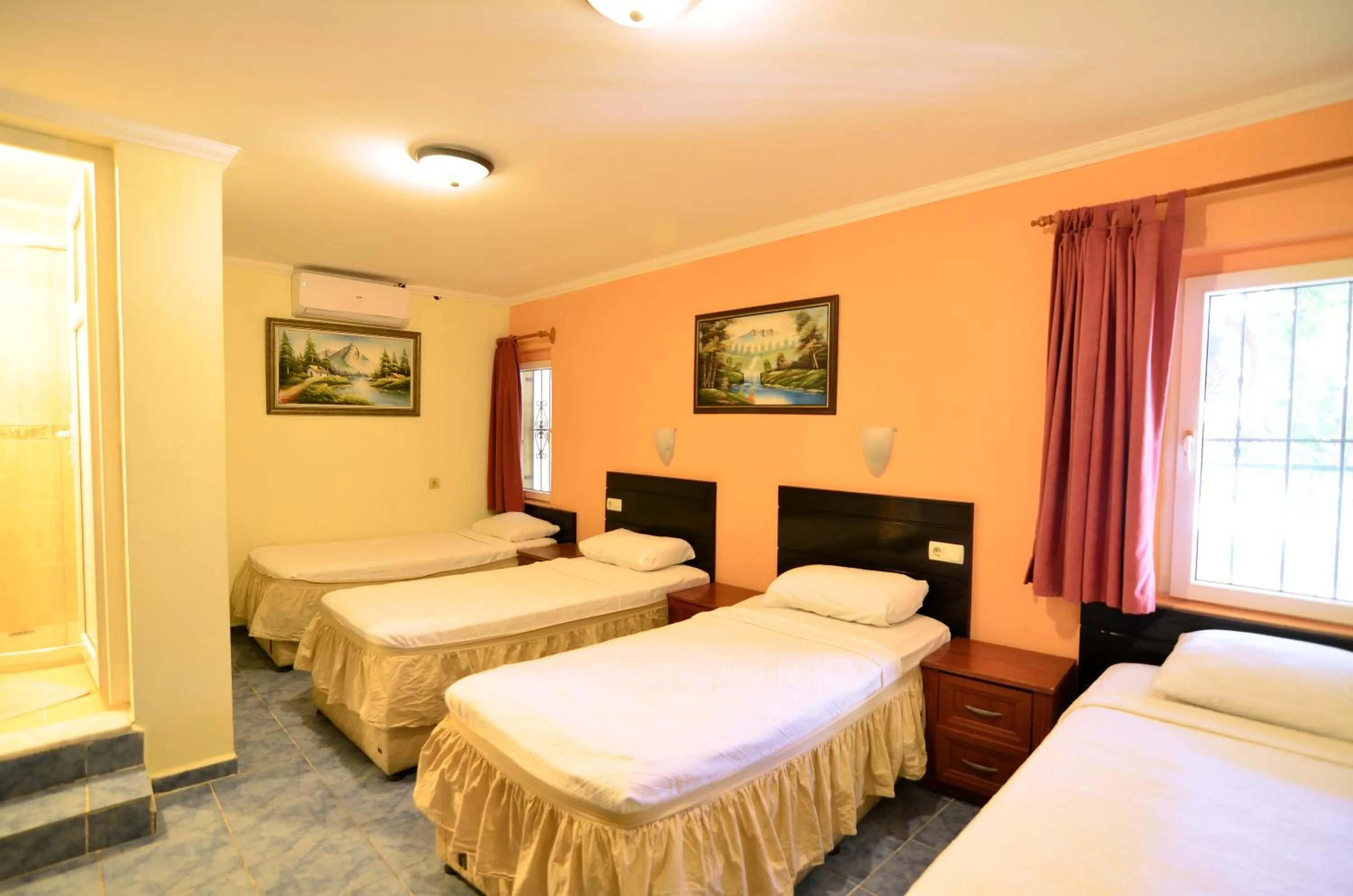 Bed in Sevin Hotel Pension