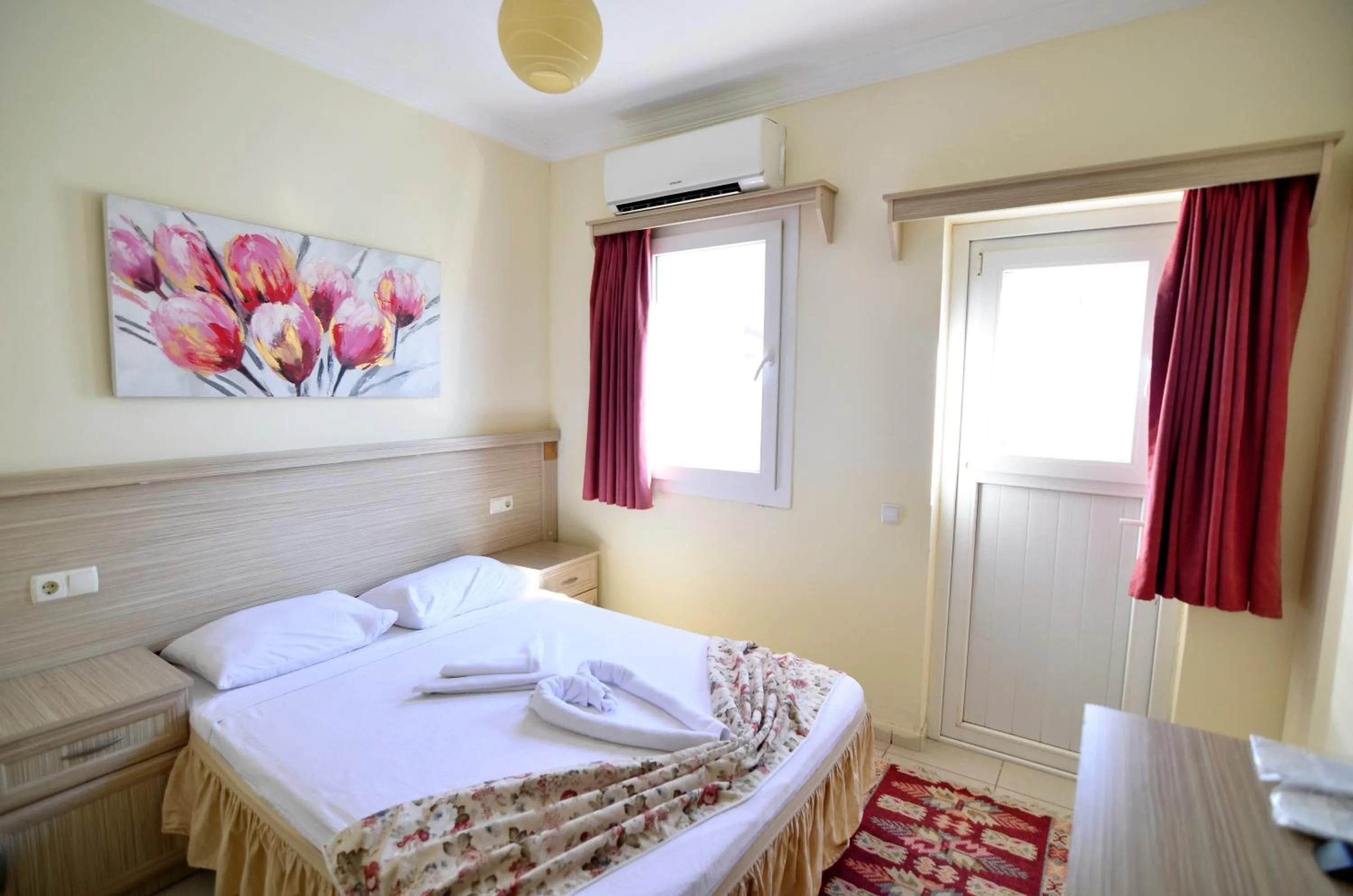 Bed in Sevin Hotel Pension