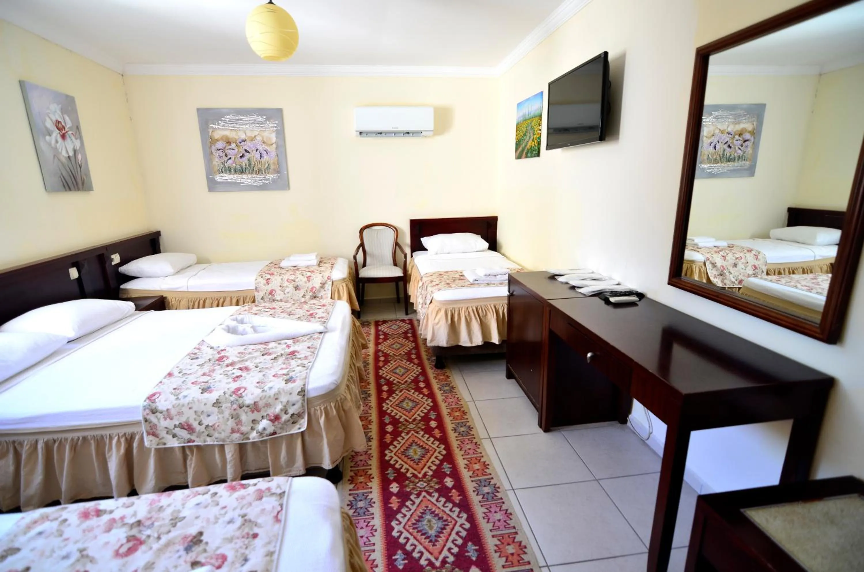 Bed in Sevin Hotel Pension