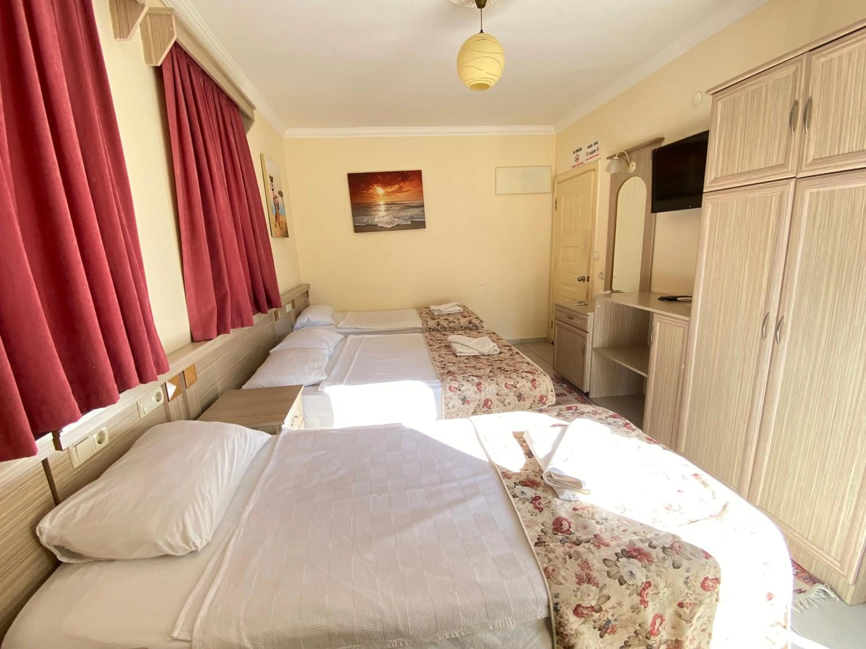 Bed in Sevin Hotel Pension