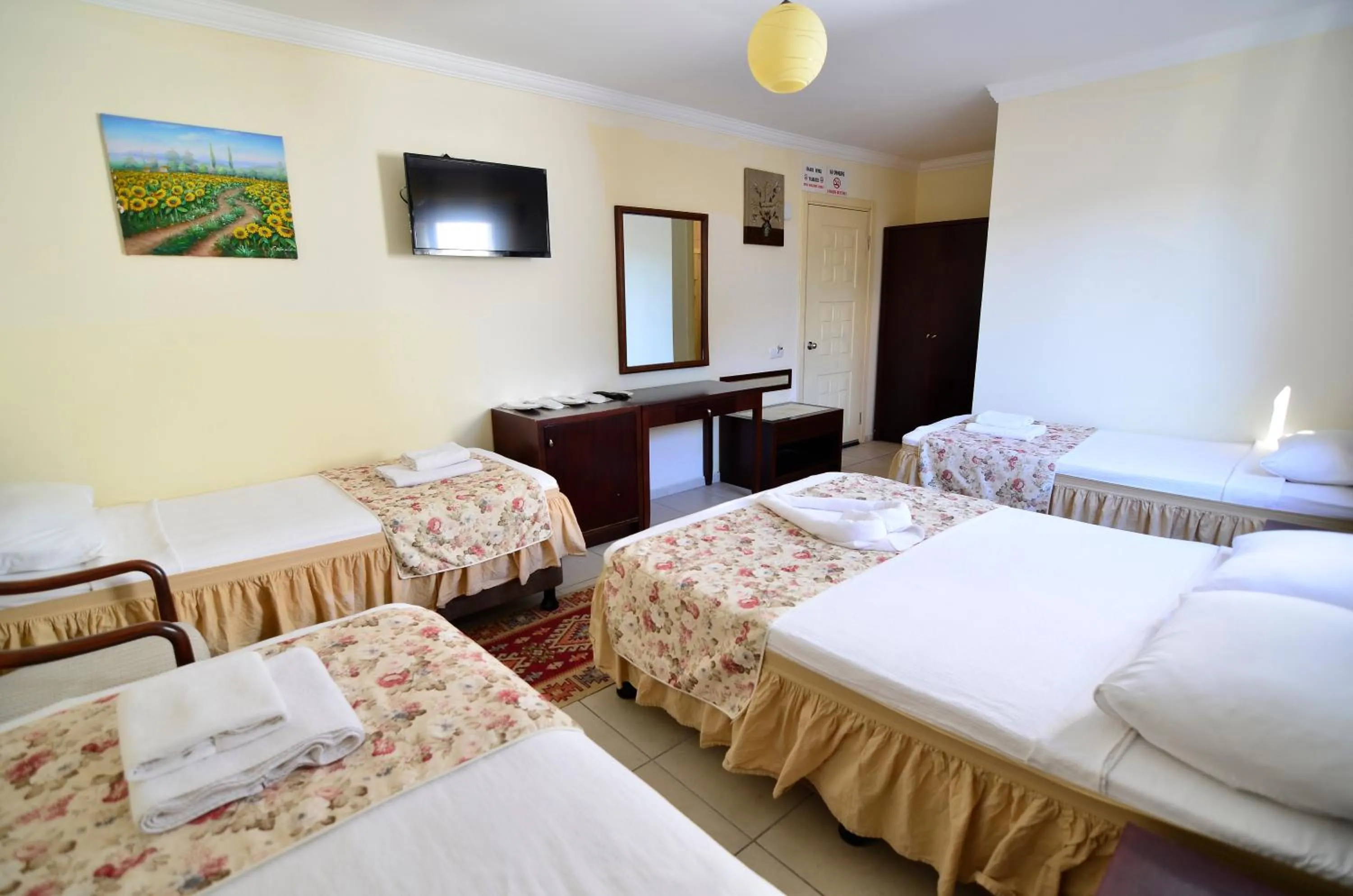 Bed in Sevin Hotel Pension