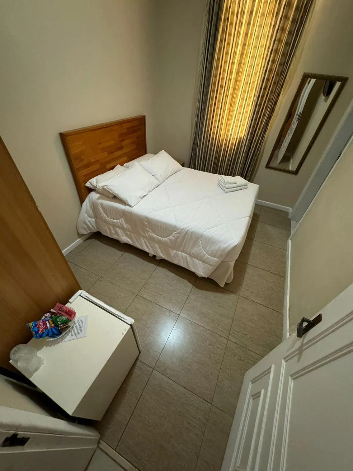 Bed in Pousada Crystal Palace