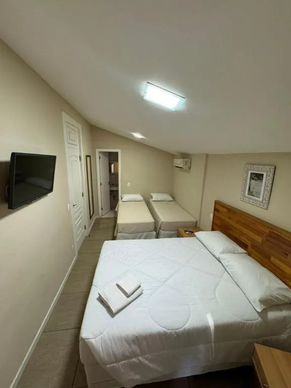 Bed in Pousada Crystal Palace