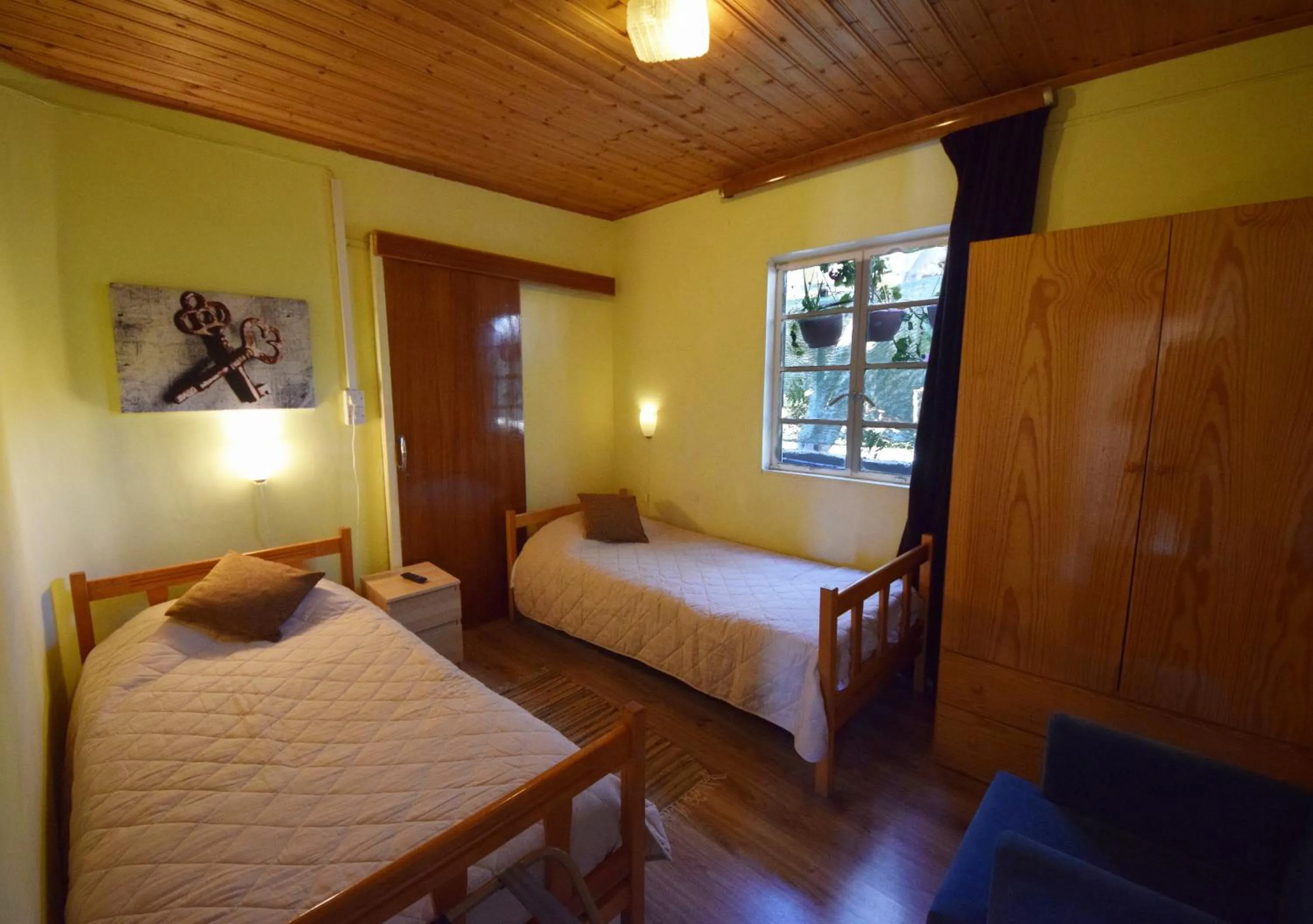 Garden view, Bed in Christys Palace Hotel