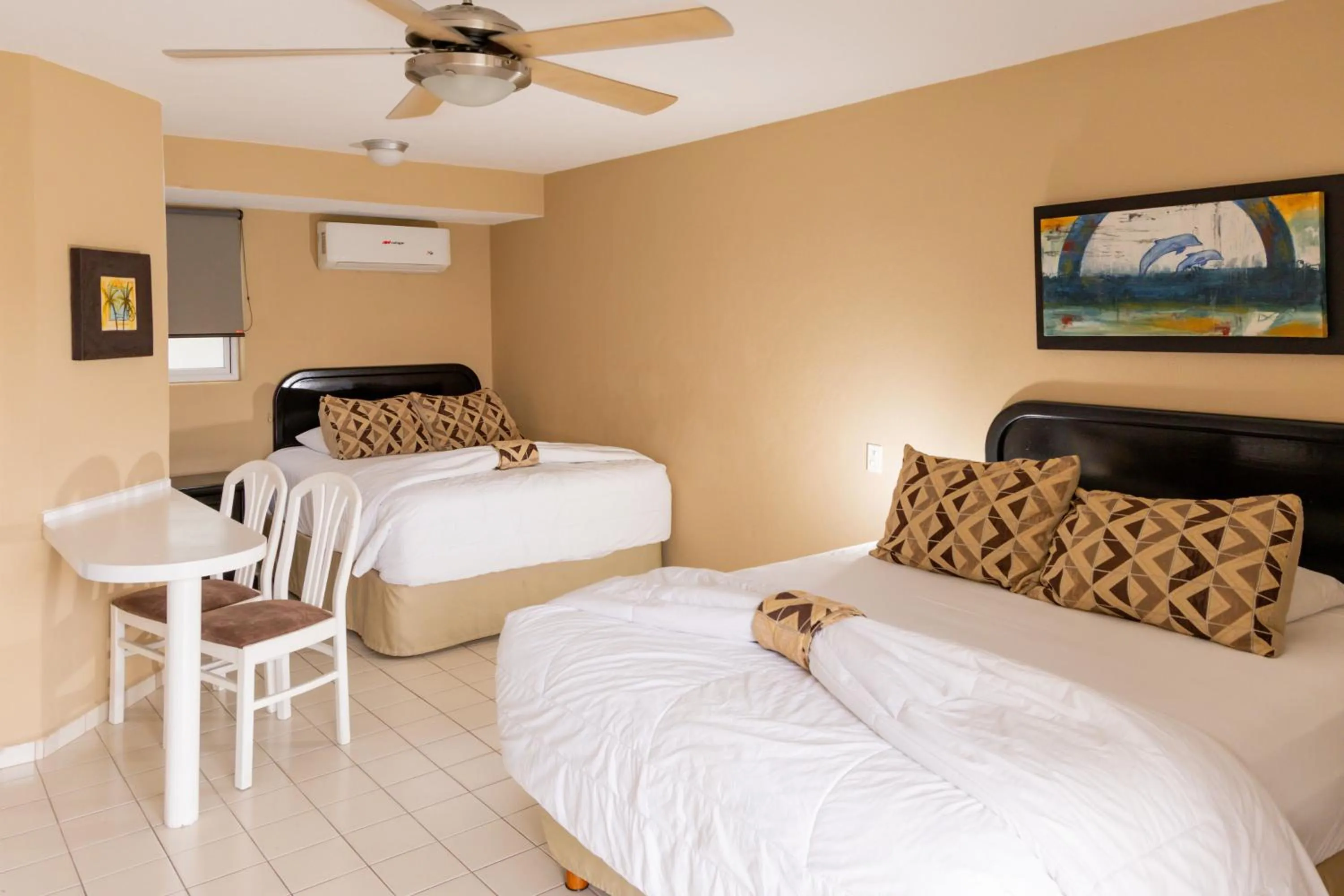 Bed in Hotel Santa Fe Los Cabos by Villa Group