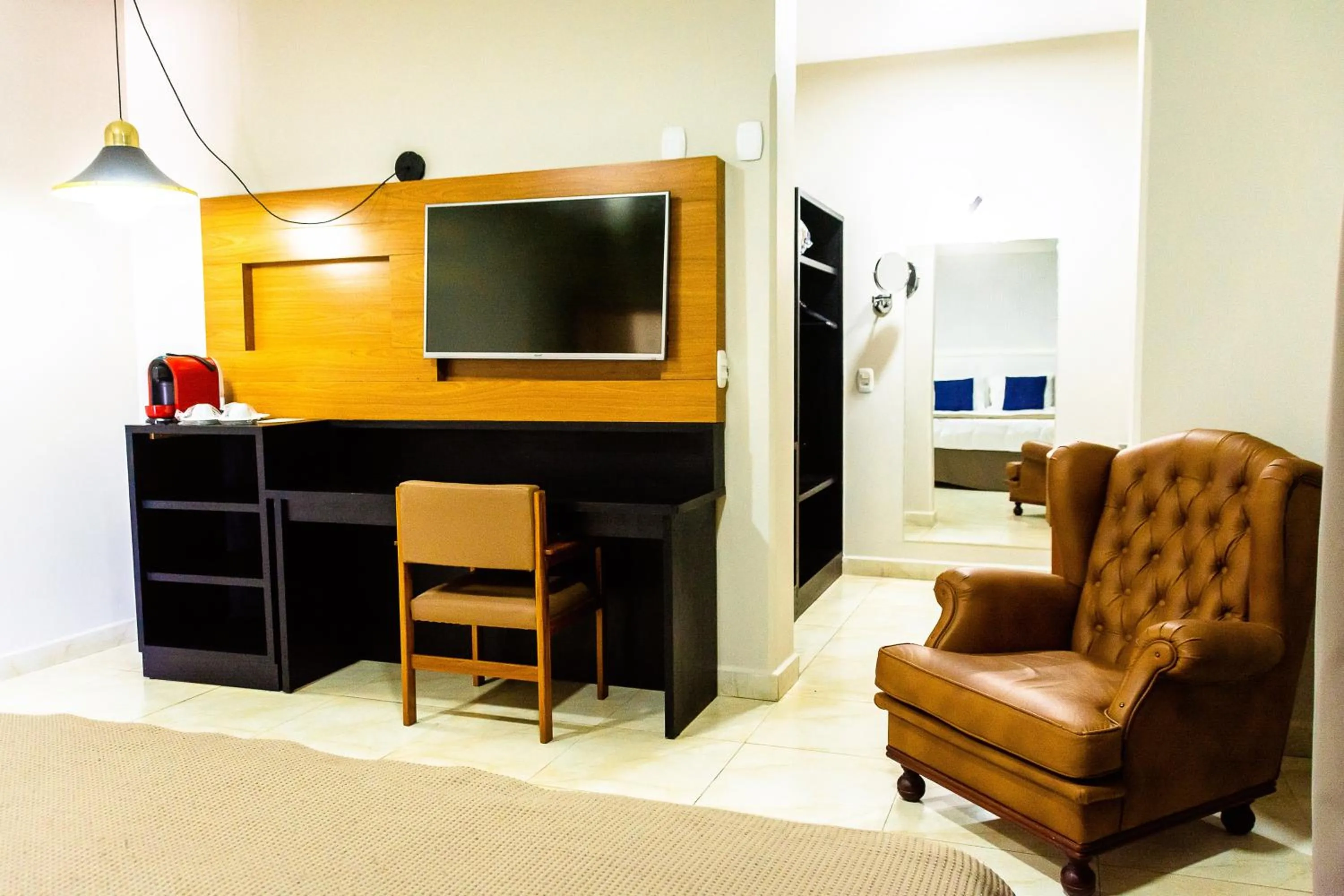 Bedroom in Fenix Hotel Pouso Alegre