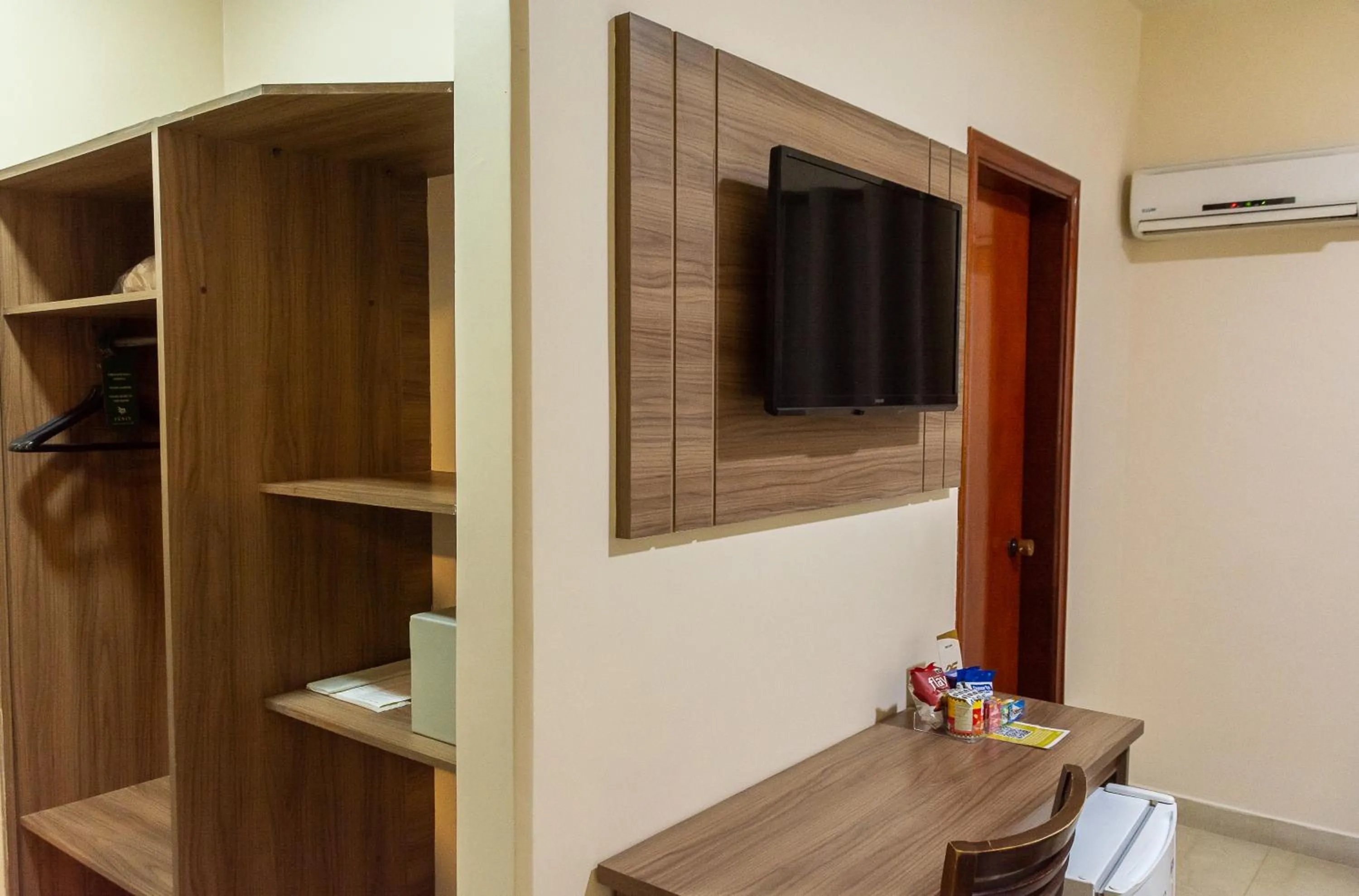 Bedroom in Fenix Hotel Pouso Alegre